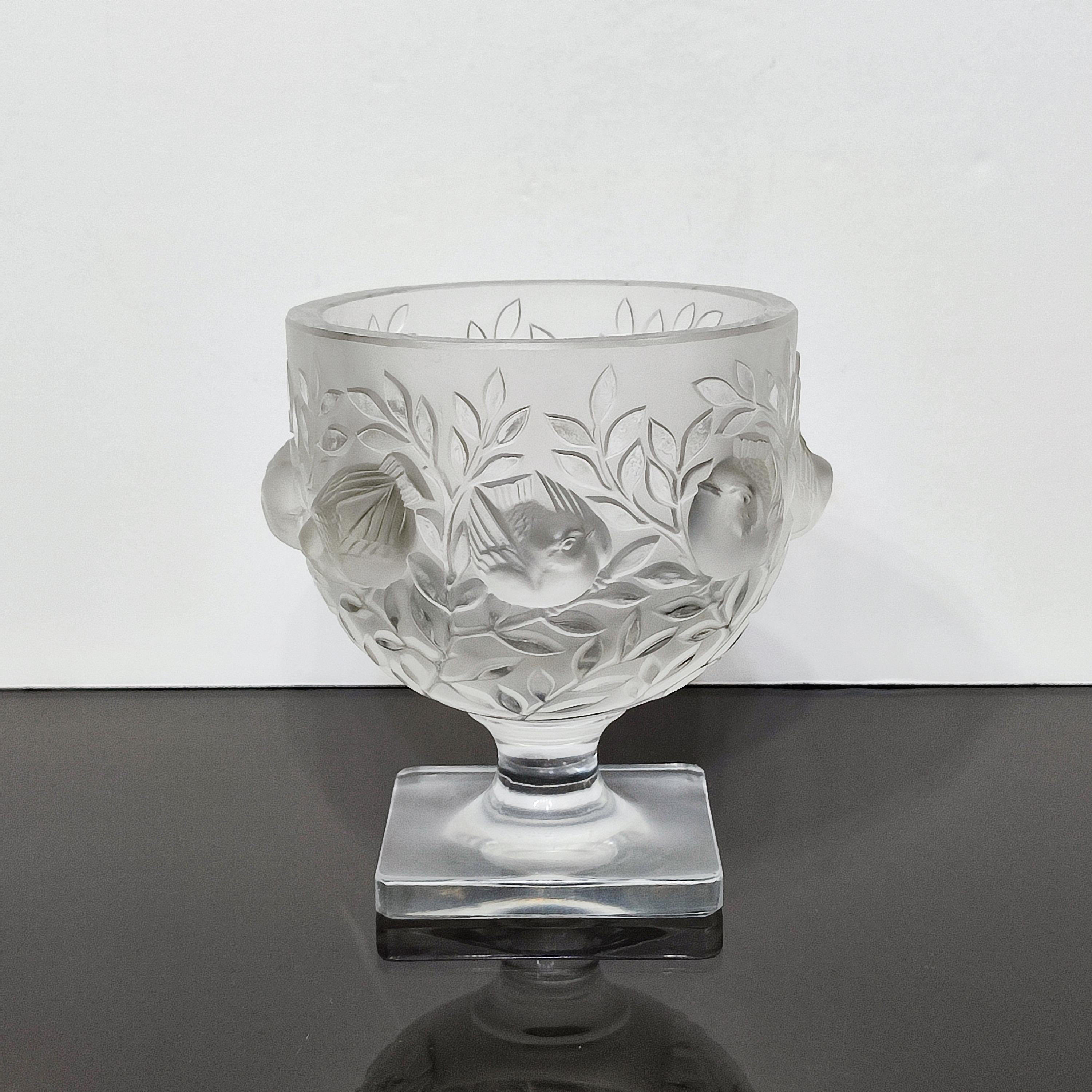 Elisabeth vase by Lalique.
Frosted crystal bowl with clear foliage branches and frosted birds all around. Clear pedestal on square foot. Signed to underside, Lalique, France. 
Designed by Marc Lalique in 1961, this vase remains a perennial favorite.
