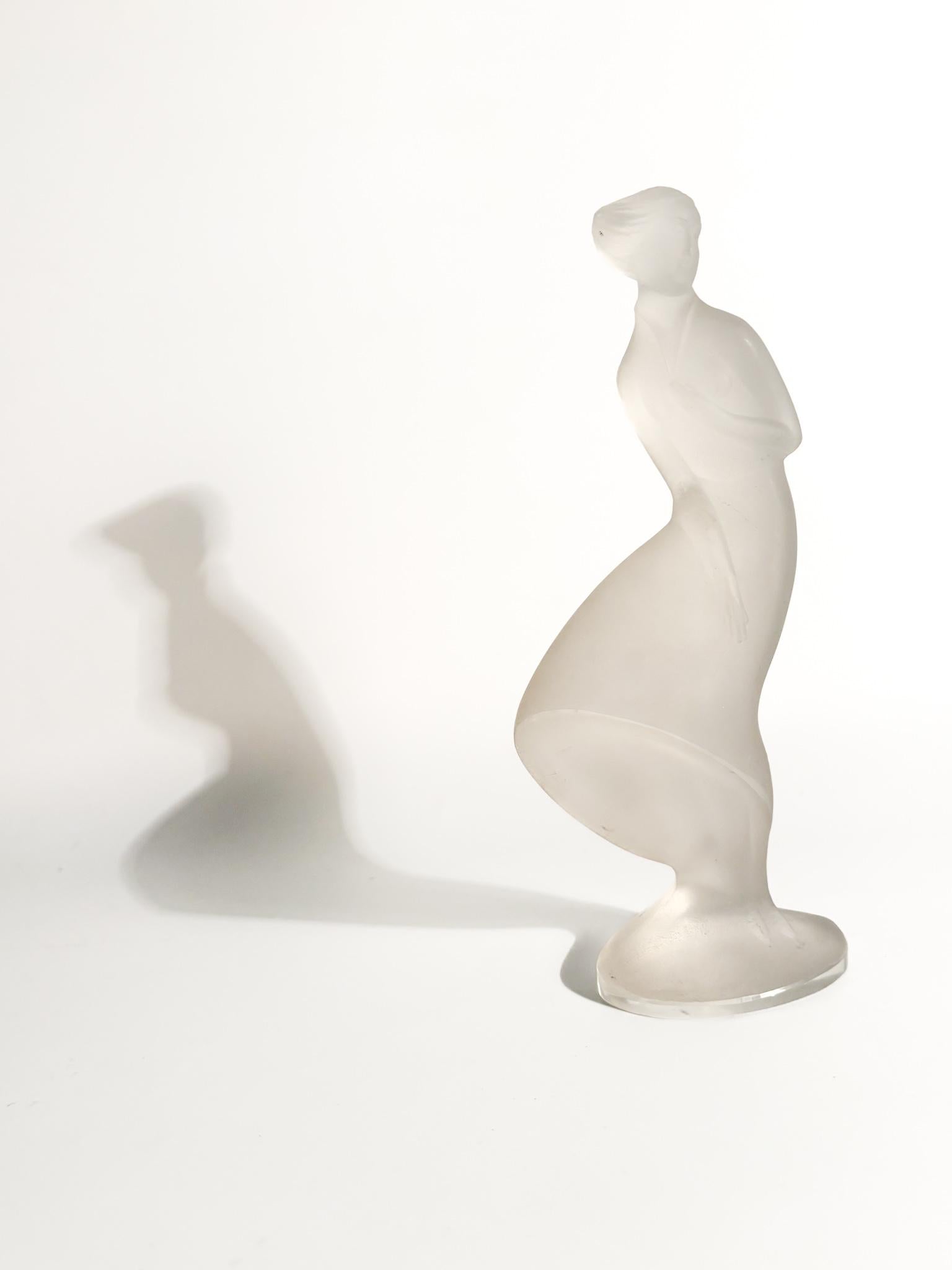 Lady of the Wind figurine in Lalique crystal, made in the 1930s. The sculpture is in good condition, only minor sign due to time are present, as shown in the pictures.

Ø cm 9 Ø cm 5 h cm 22

The Lalique Crystal refers to the glassware produced by