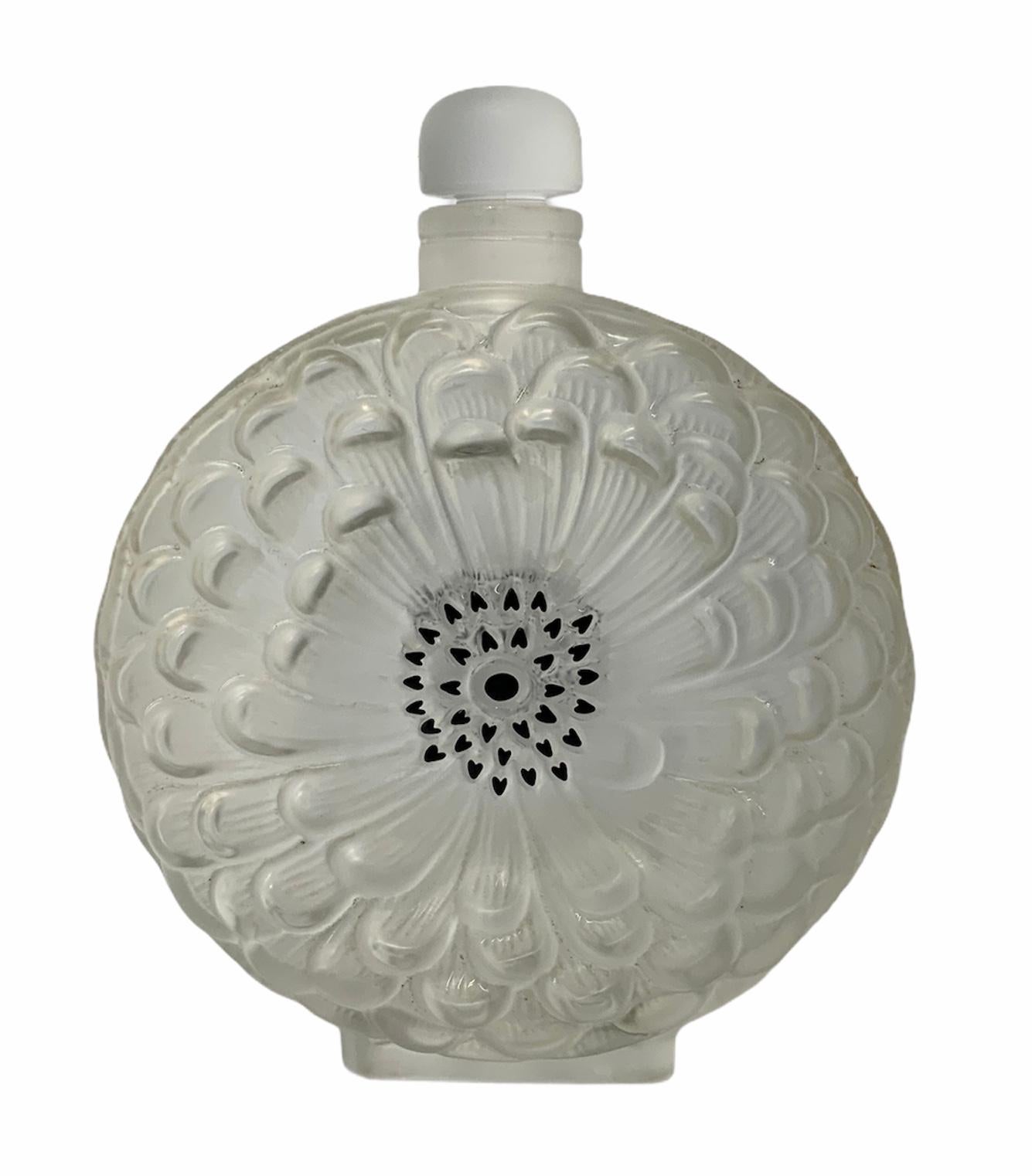 perfume bottle with flowers