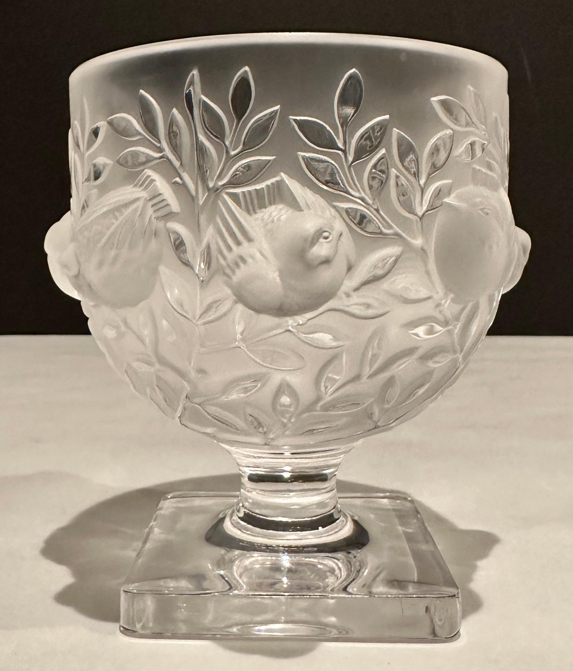 Lalique Elizabeth clear and satin crystal vase. Signed on bottom, Lalique, France.
Created in 1961, by Marc Lalique, this vase pays tribute to two of the themes dearest to René Lalique: the Fauna and Flora. Nestled among foliage, sparrows carved in