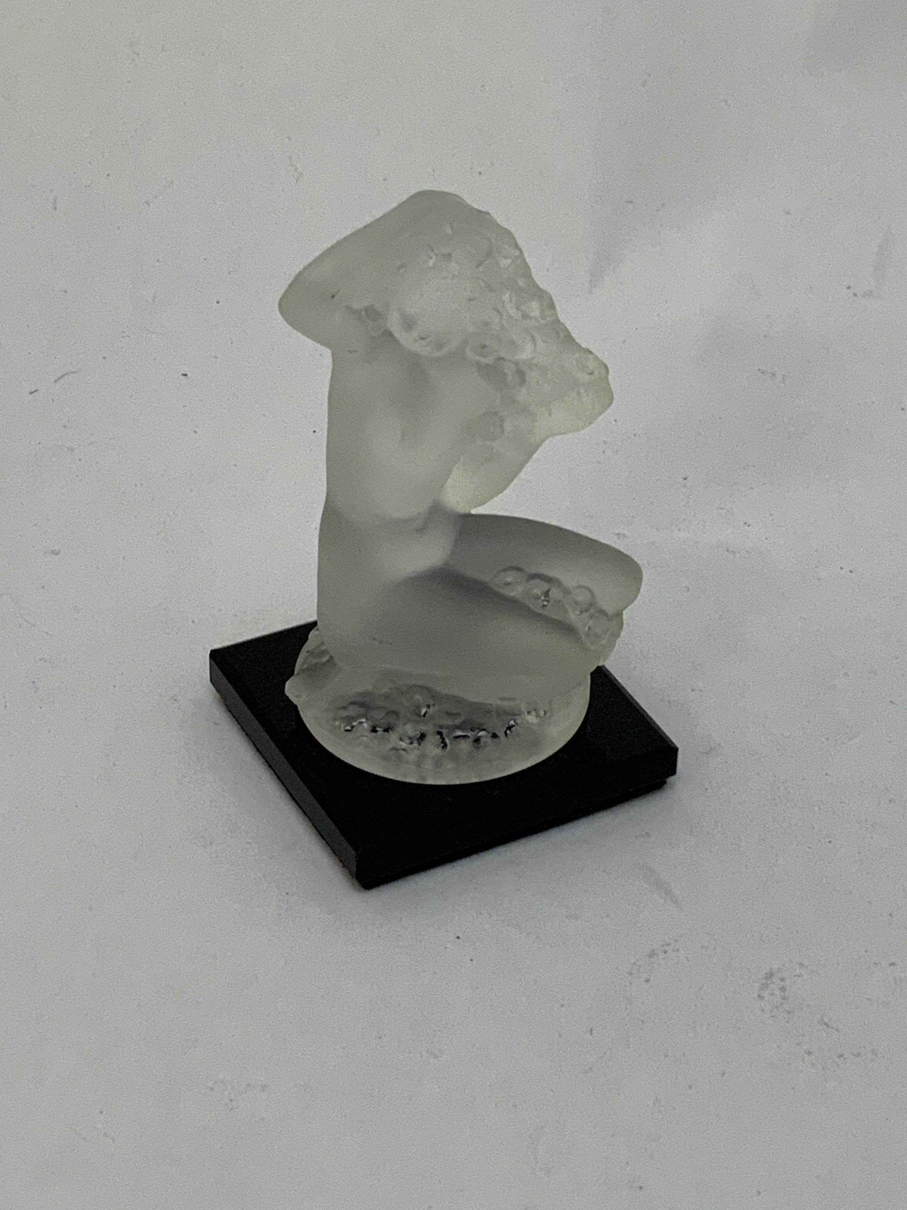 Acid stamped Lalique, France Floreal female nude paperweight. Black glass base, circa 1960-1970. Very good condition.

Base measures 2