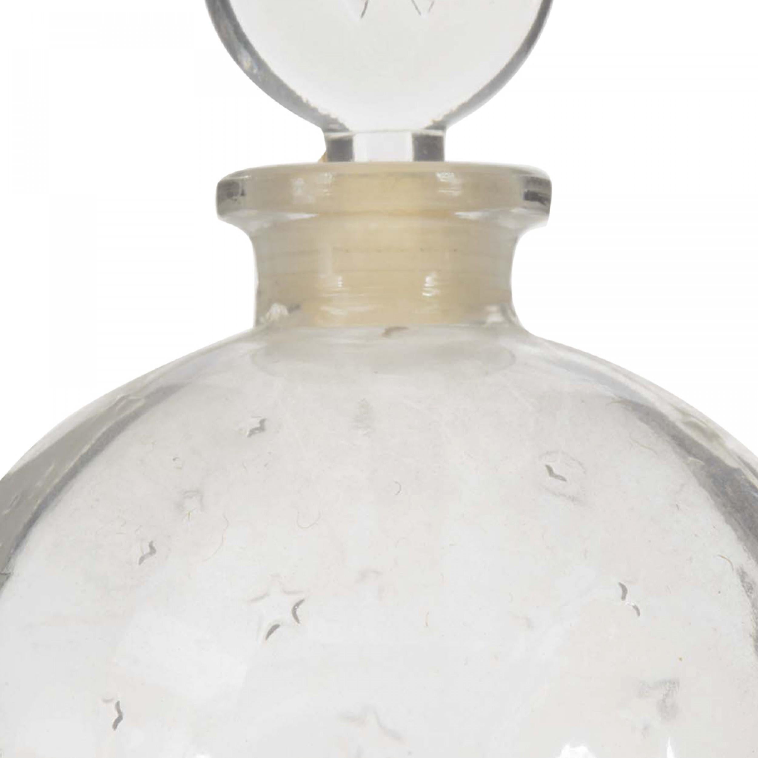 flacon de parfum en forme d'etoile