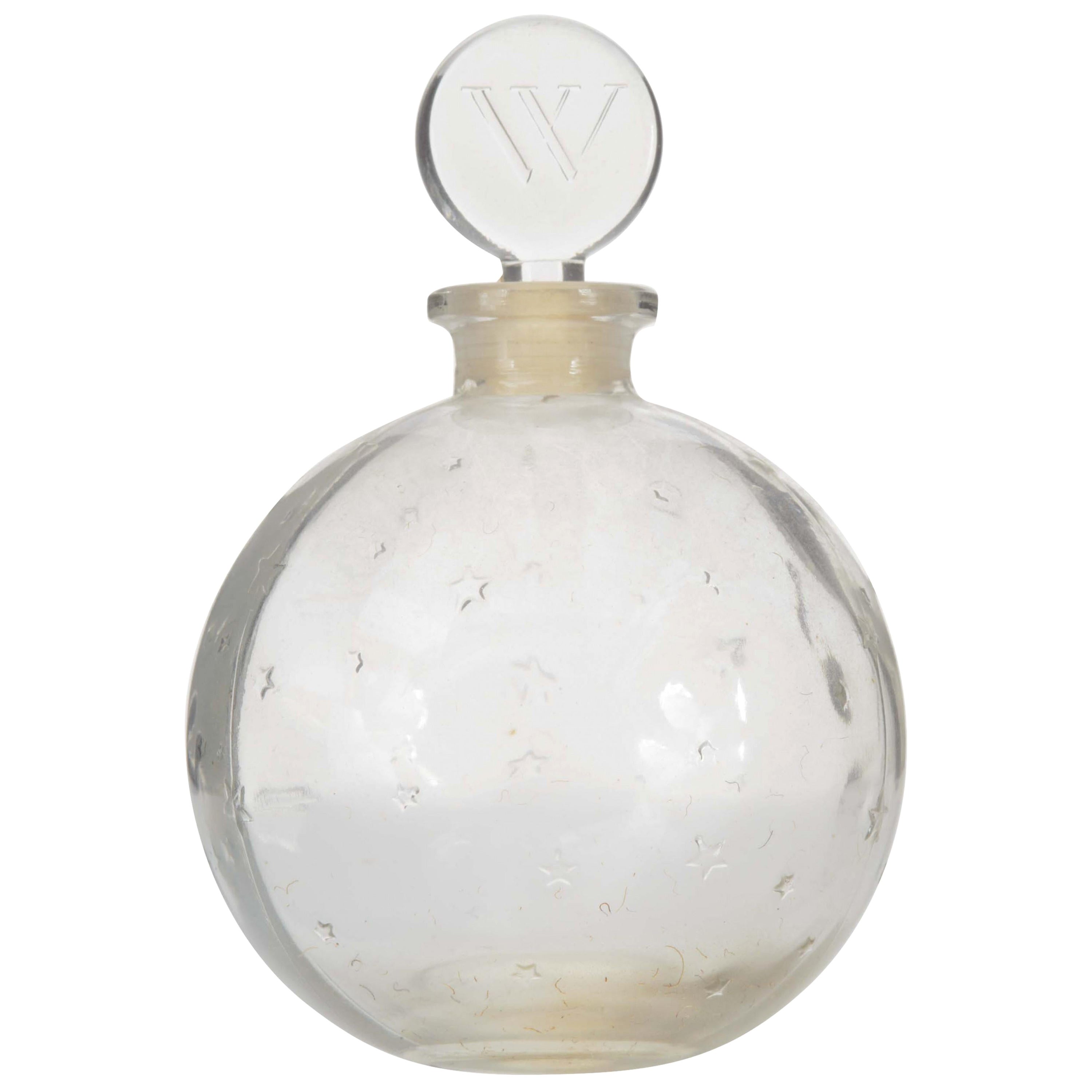 Französische Parfümflasche im Art déco-Stil von Lalique für Worth mit erhabenem Sterndesign