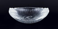 Lalique, France. Art glass bowl with relief decoration. 1980s.