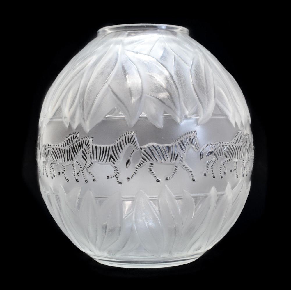 Lalique France crystal art glass and enamel Tanzania white vase by Marie-Claude Lalique, 1991. Satin leaves to the top and base of the vase with charming hand painted enamel zebras galloping to the circular band. Marked to the underside and comes