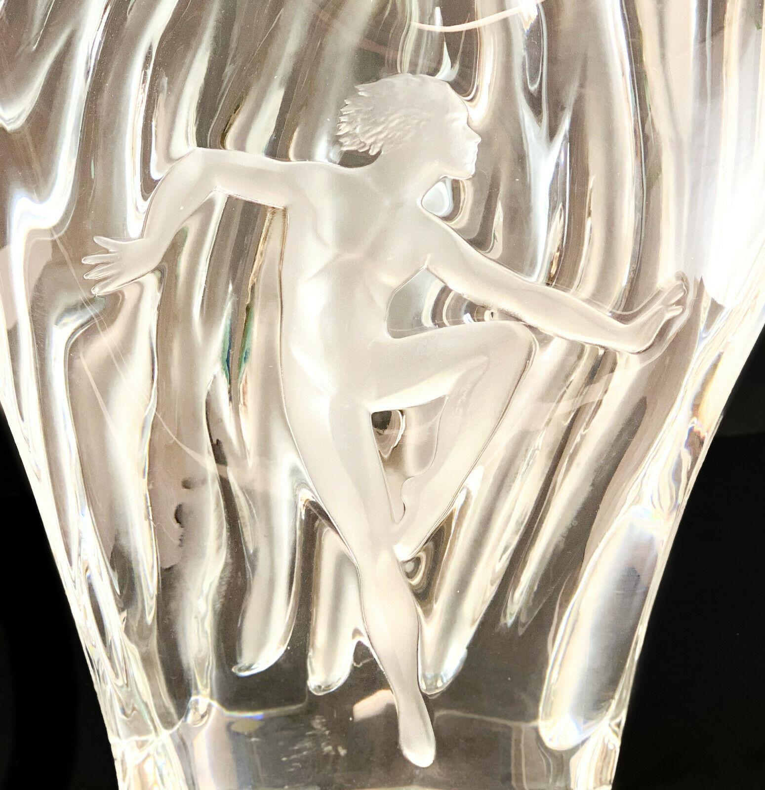 Lalique France crystal glass Dora Vase, limited edition of 99. A ribbed texture throughout the vase with a figural image of a nude dancer to the central area. Marked 