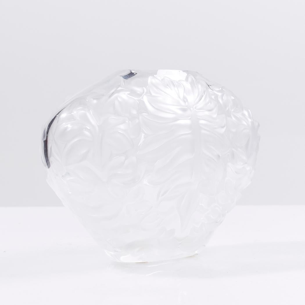 Lalique France Mahe Clair Palm Leaf Vase

This vase measures: 8.25 wide x 3.75 deep x 6 inches high

We take our photos in a controlled lighting studio to show as much detail as possible. We do not photoshop out blemishes. 

We keep you fully