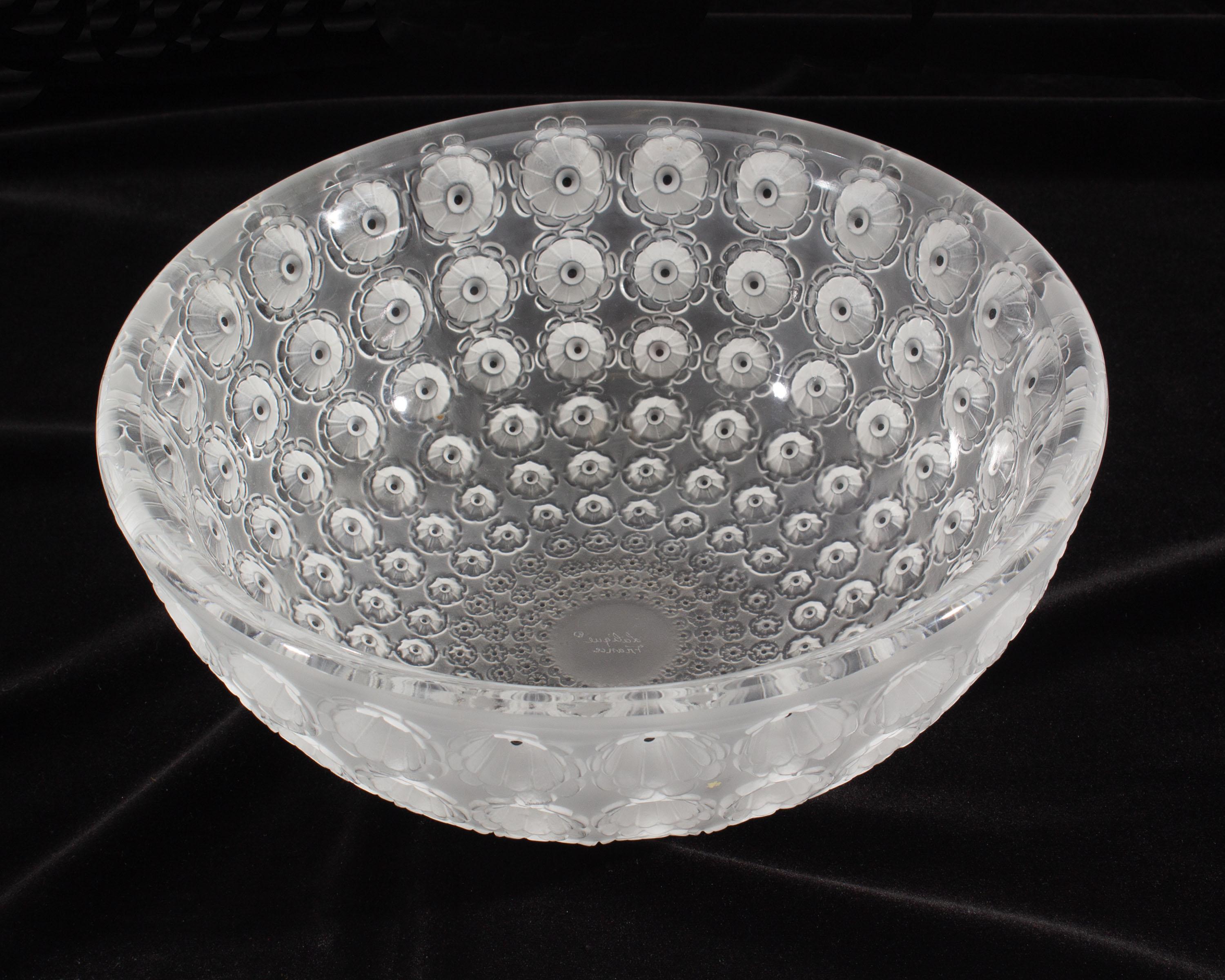 A vintage Lalique France “Nemours” crystal bowl. The frosted bowl is comprised of recessed 