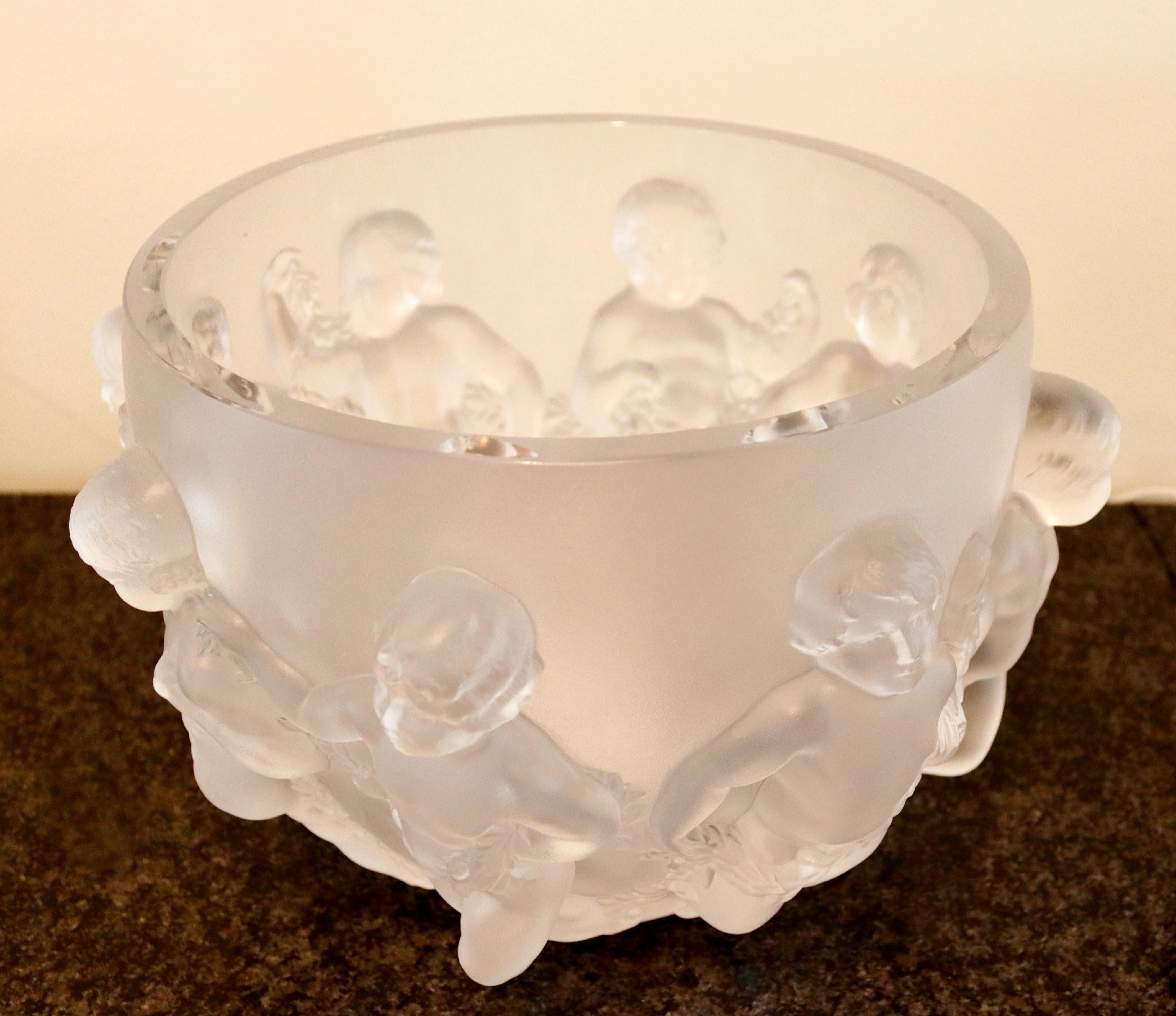For your consideration is an incredible, crystal bowl called Luxemburg with cherubs engraved in the glass, signed Lalique Paris. In excellent condition. The dimensions are 12.5