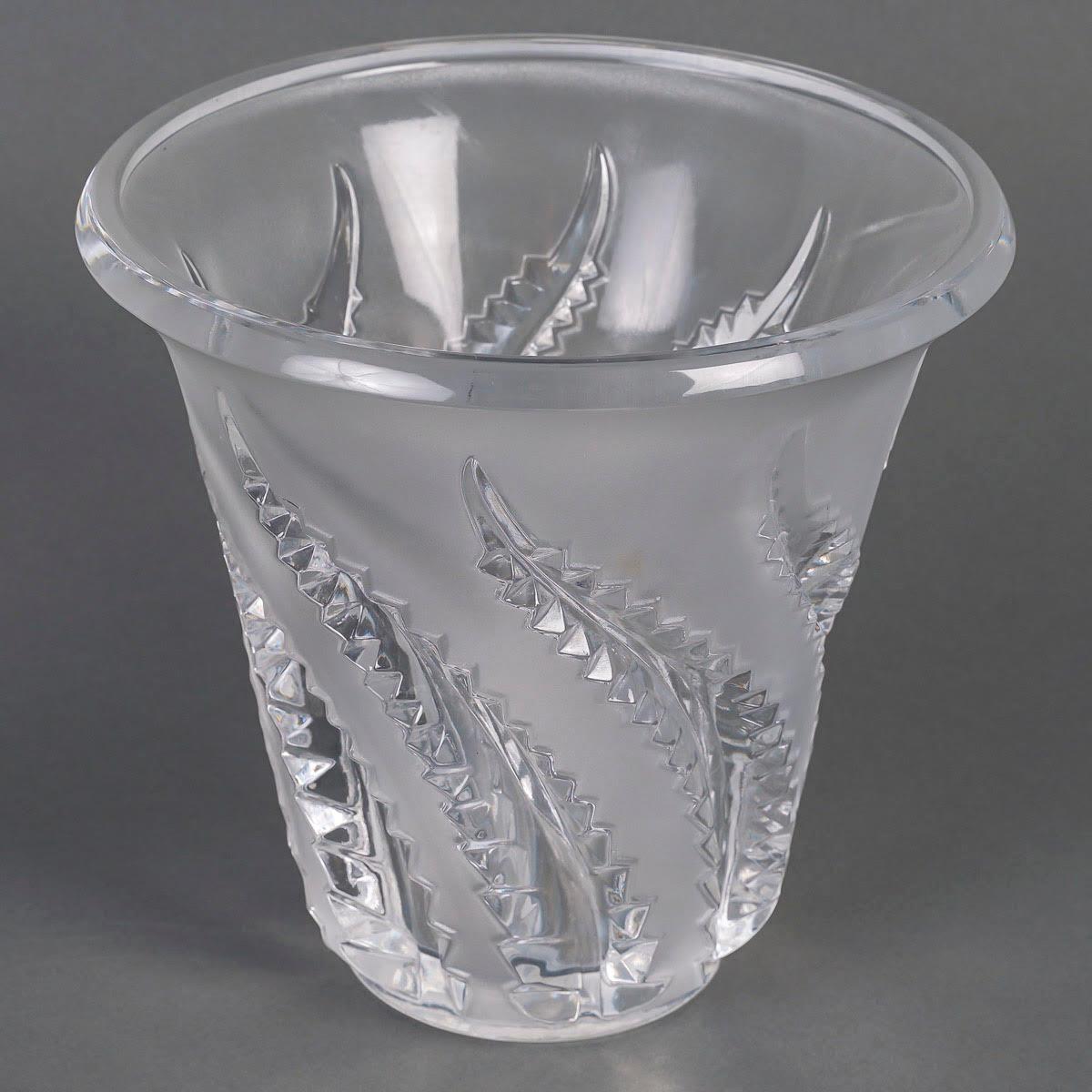 Lalique France vase, Crystal, XXth Century.

Lalique France crystal vase in the taste of the Art Deco period, Late 20th century.
h: 19cm, d: 20cm