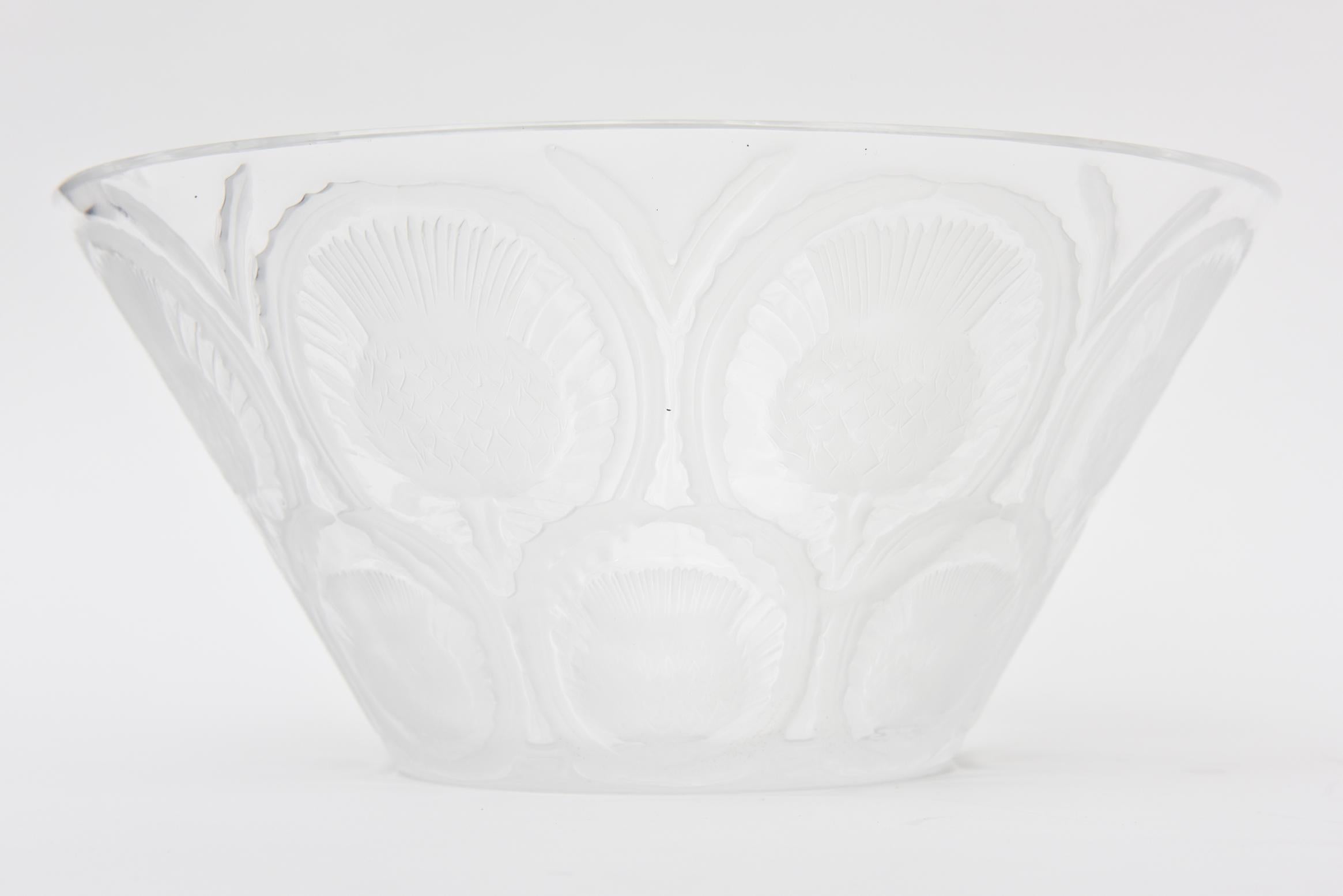 This lovely French signed Lalique molded glass bowl has alternating and repeated patterns of both frosted and clear glass embossed images of thistles. It is 20th century, France. Classic. This would make an elegant serving bowl or a small