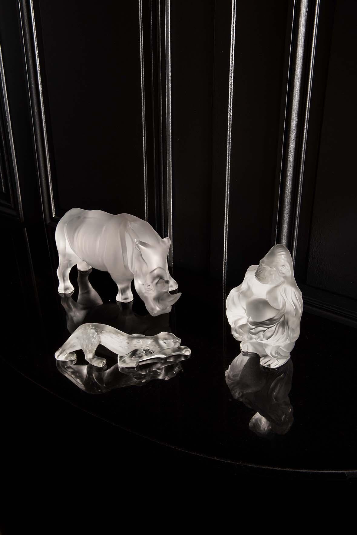 Inspired by the fauna of the jungle, new wild animal sculptures have been added to the Lalique bestiary. Lalique's signature contrast of satin finished and repolished crystal contrasts the design of this symbol of strength and power.