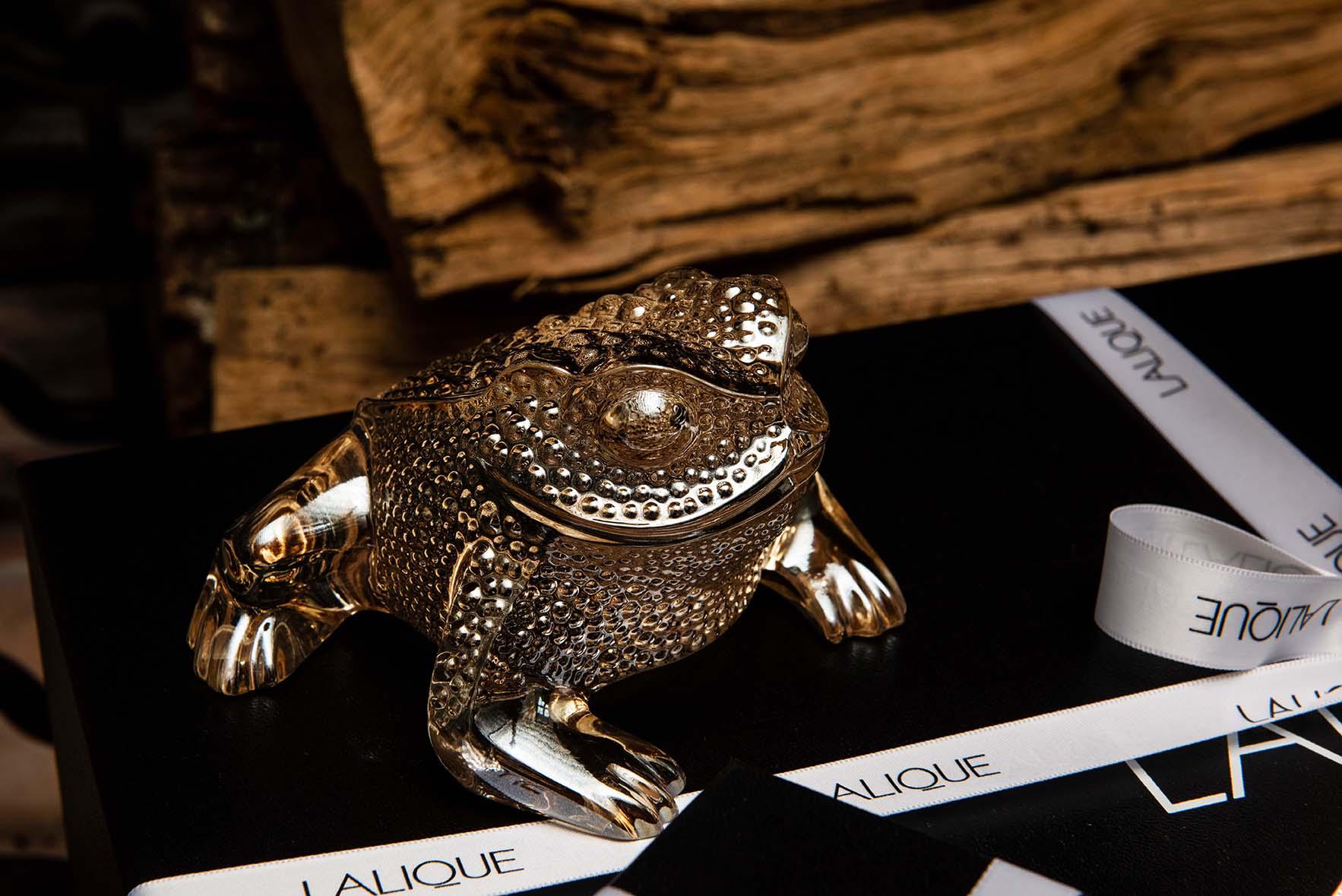 Inspired by the fauna of the natural world, Lalique continues to expand its bestiary to include the Gregoire Frog in illustrious gold luster.
