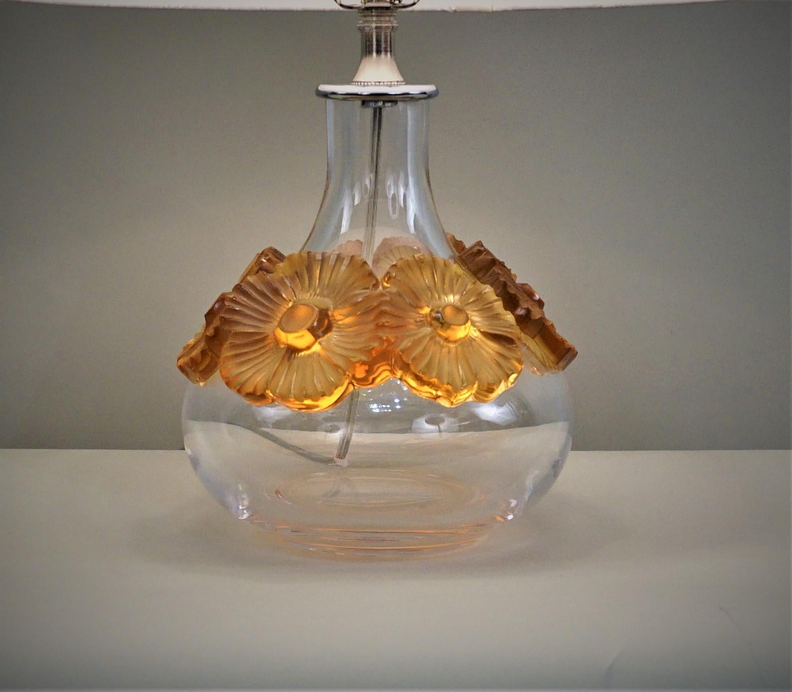Floral design amber over clear glass Lalique crystal table lamp.