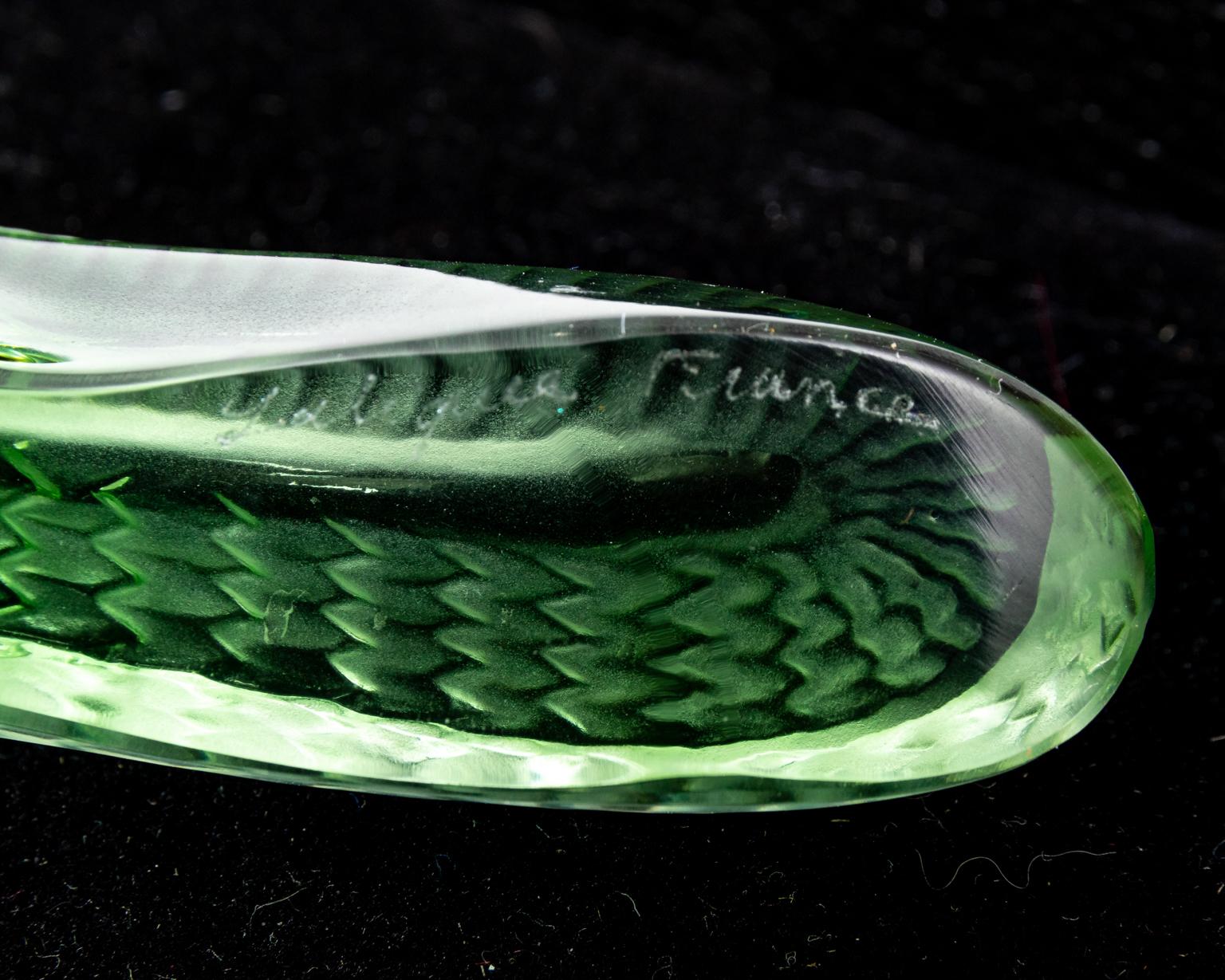 French lizard figurine by Lalique in a mint green colored glass. The piece is signed with Lalique maker's mark. Made in France. Please note of wear consistent with age.