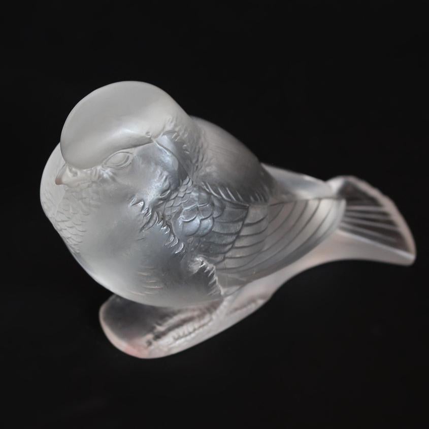 Moineau Fier, an Art Deco glass paperweight. A proud sparrow in frosted glass set on an integral base. Model number 1149. R Lalique France raised to side. 

Literature: Marcilhac, R Lalique Catalogue Raisonné de L'Œuvre de Verre p.384.





 