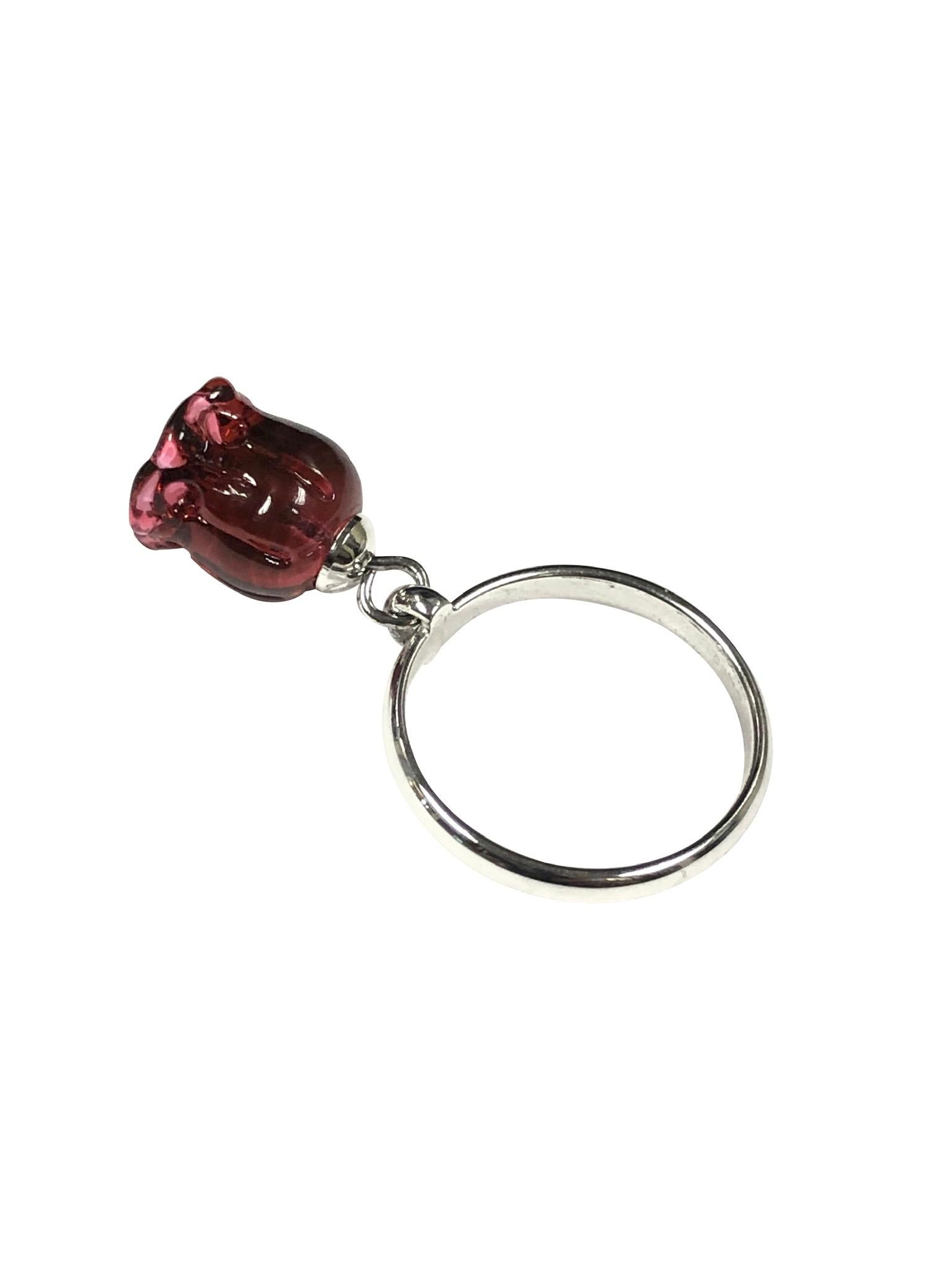 Circa 2010 Lalique Muguet Red Crystal Lilly Flower Ring, The flower measures 3/8 inch and is suspend off of the 2 M.M. wide Sterling Silver band Ring, finger size 6 1/2. This is New, unworn in the original presentation box with certificate booklet. 