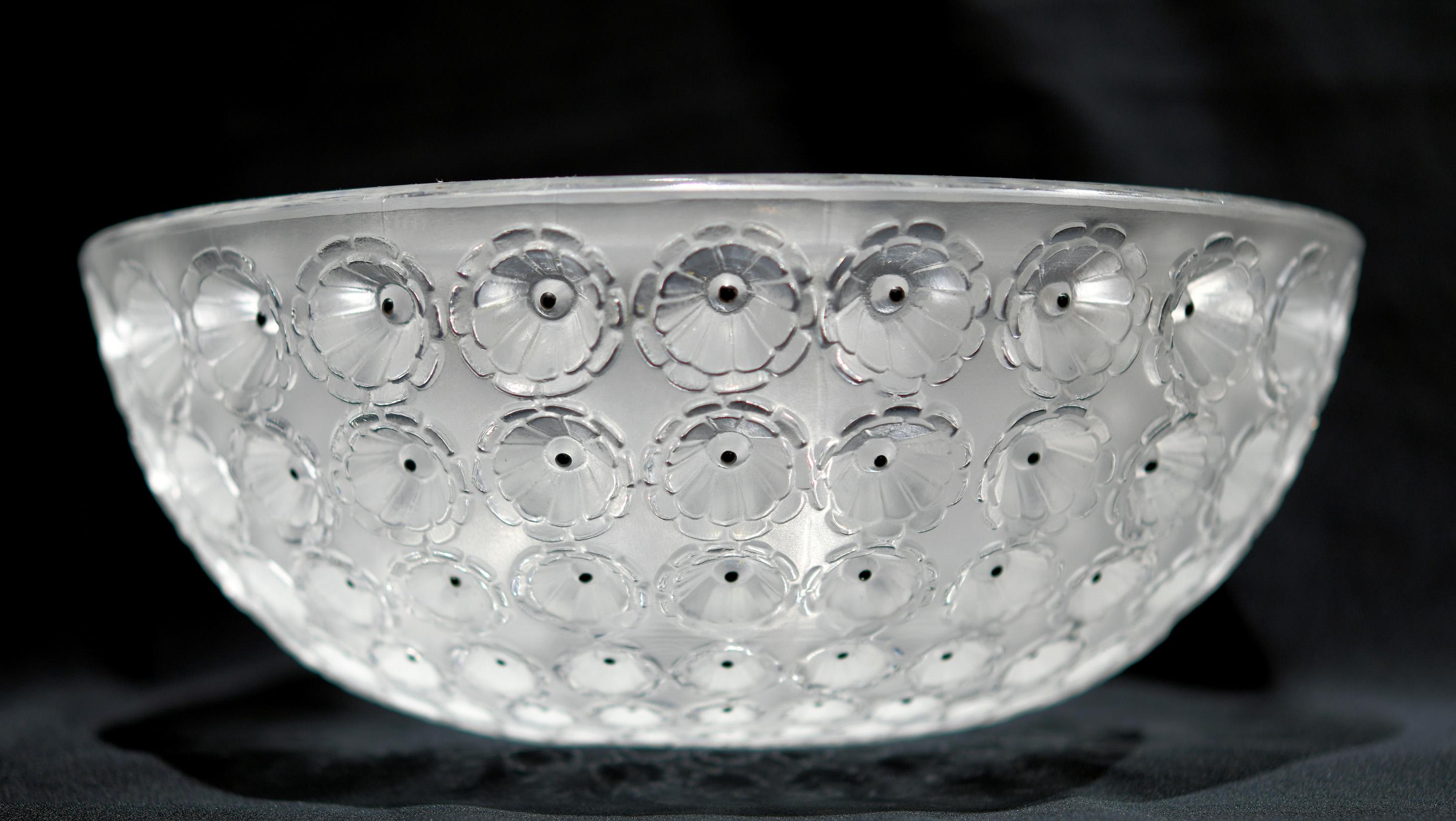 Lalique “Nemours” Bowl designed in 1929 by René Lalique in clear and frosted glass, circa 1980.The Nemours bowl is a magnified depiction of the poppy flower of which the town of Nemours has made poppy candy its specialty. Highlighted with hand