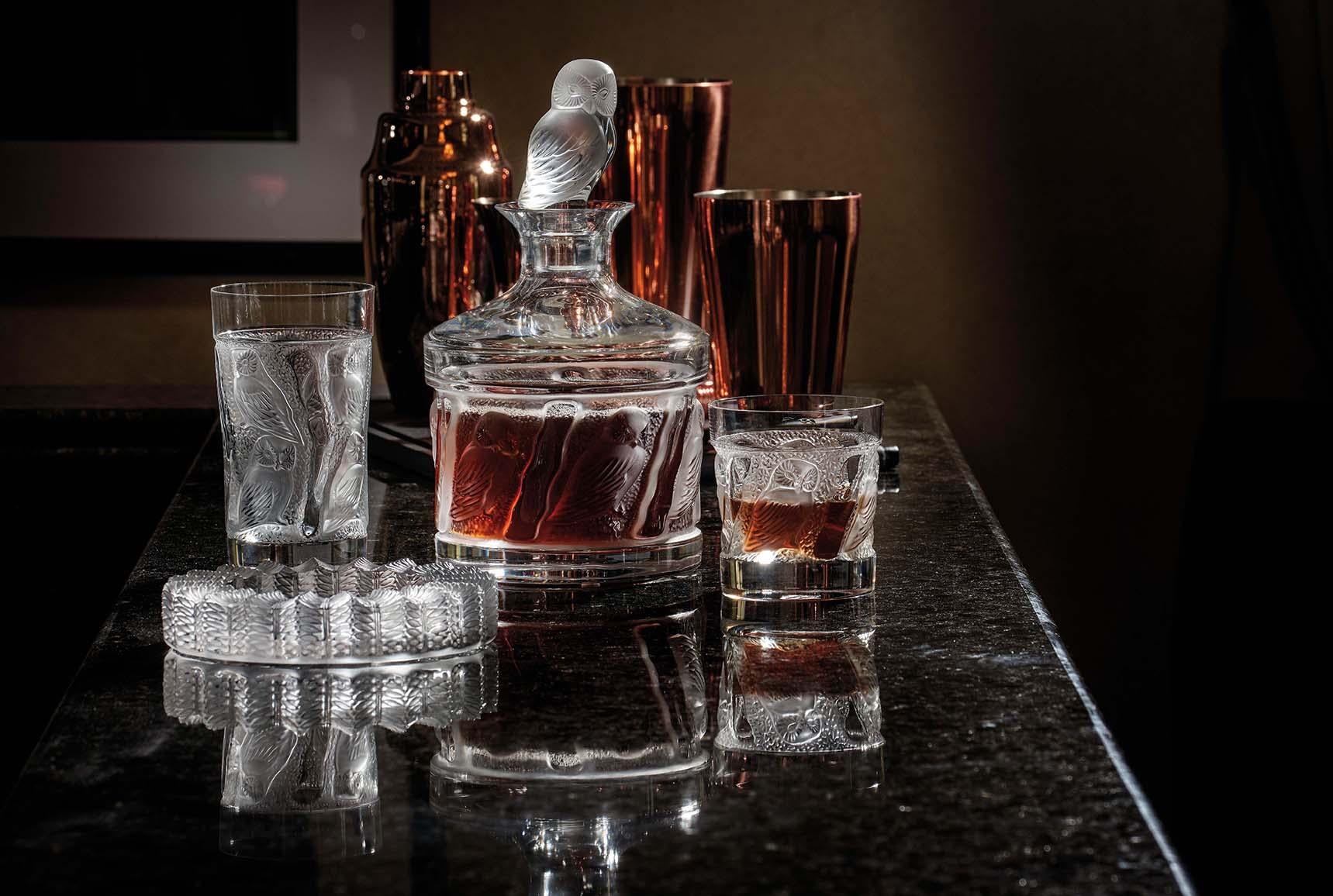 Designed by Marie-Claude Lalique in 1995, the Owl collection has become synonymous with the enjoyment of fine spirits. The highly detailed design of the tumbler, inspired by the wise and mysterious owl, is enhanced by the rich hues of the rarest of