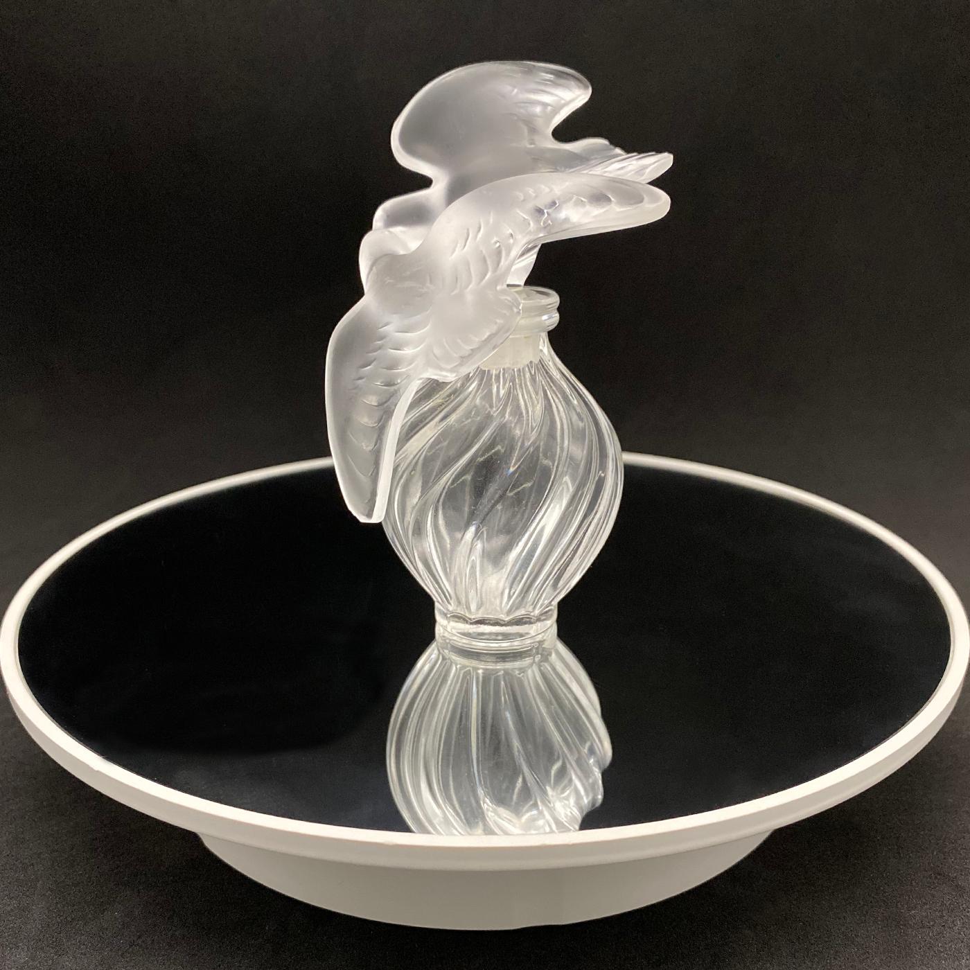 This Lalique perfume bottle is made for Nina Ricci 