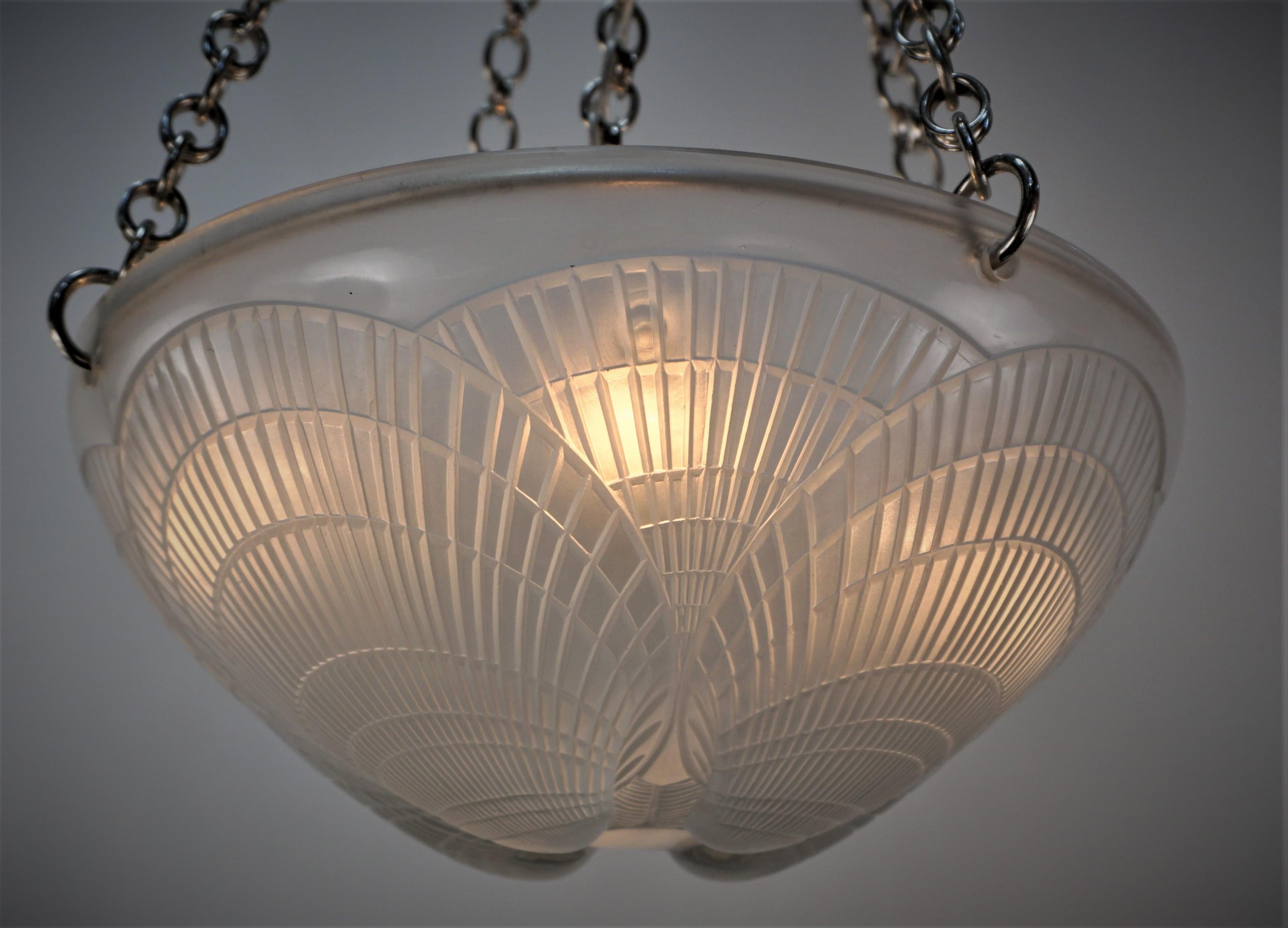Rene Lalique seashell design Art Deco chandelier.
Four lights 60 watts each.
Professionally rewired and ready for installation.