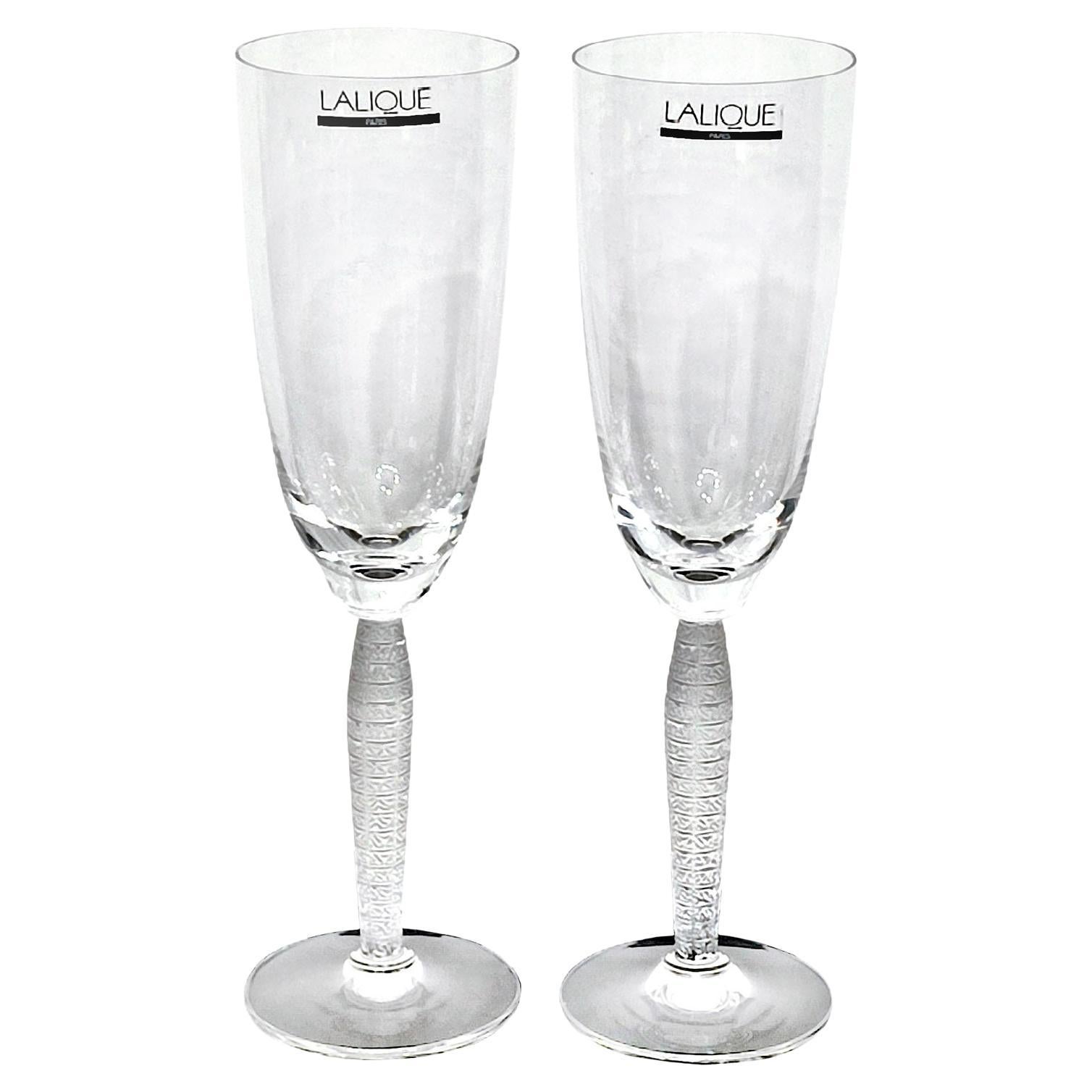 https://a.1stdibscdn.com/lalique-set-of-2-louvre-champagne-flutes-for-sale/f_9804/f_317232321670965644945/f_31723232_1670965645371_bg_processed.jpg