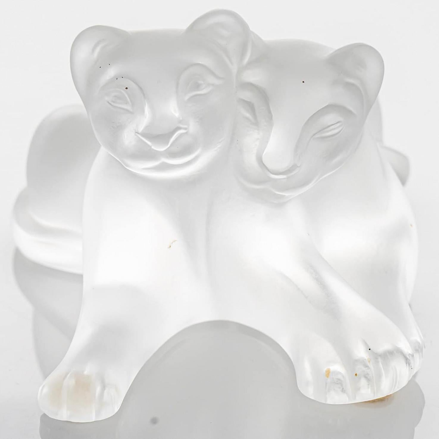 Luxury at its finest,  A collector’s item made by Lalique in France. These frosted crystal lions are made by Lalique.

The Lalique Simba is a beautiful crystal sculpture of two lions sitting next to each other. Signed by Lalique.

Lalique

Lalique