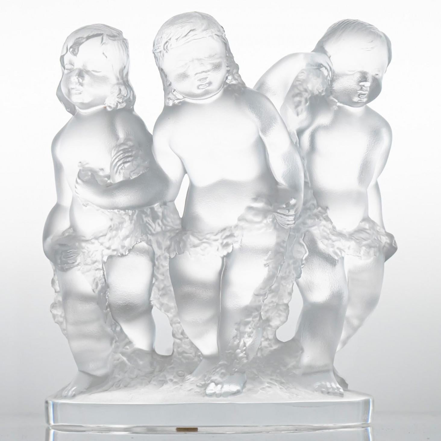 Luxury at its finest,  A collector’s item made by Lalique in France. This high-end piece is made by Lalique.

The Lalique Luxembourg is a radiant crystal sculpture of threen children made of frosted crystal glass. Crafted with purity and grace, it