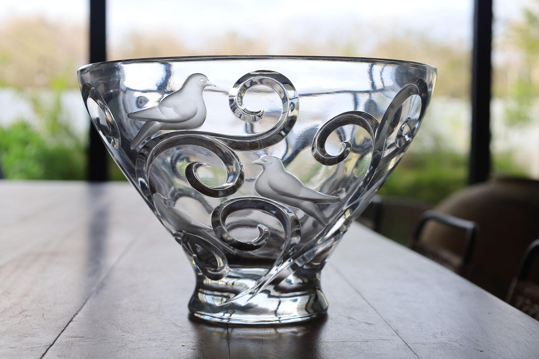 René Lalique became synonymous with French Art Nouveau decorative arts. René Lalique was born in 1860 and first began designing fine jewelry in Paris in 1881. Lalique pursued increasingly more innovative experimentation in glass commencing around