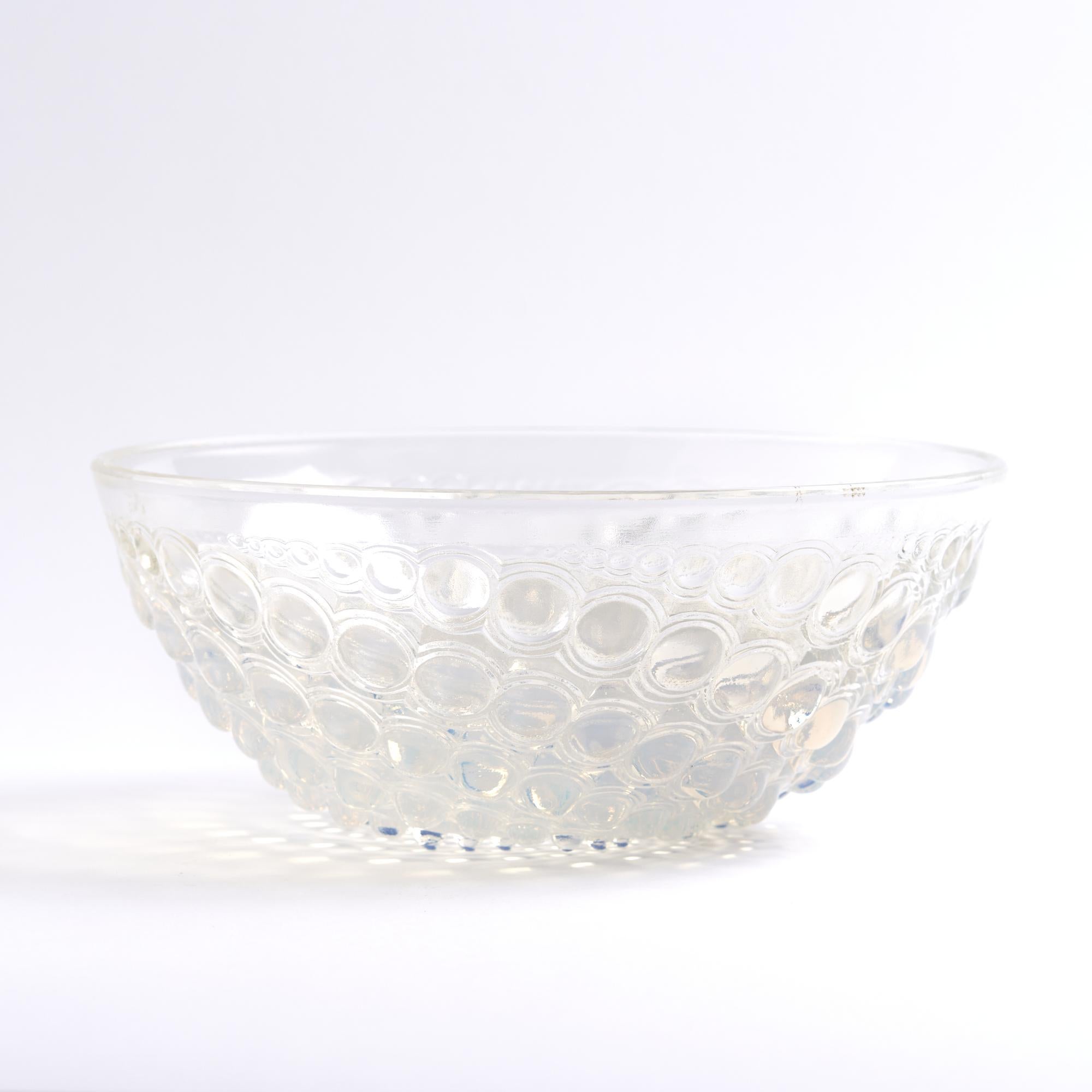Lalique Volutes Opalescent Glass Bowl

This plate measures: 8 wide x 8 deep x 3.25 inches high

Great Vintage Condition

We take our photos in a controlled lighting studio to show as much detail as possible. We do not photoshop out blemishes. 

We
