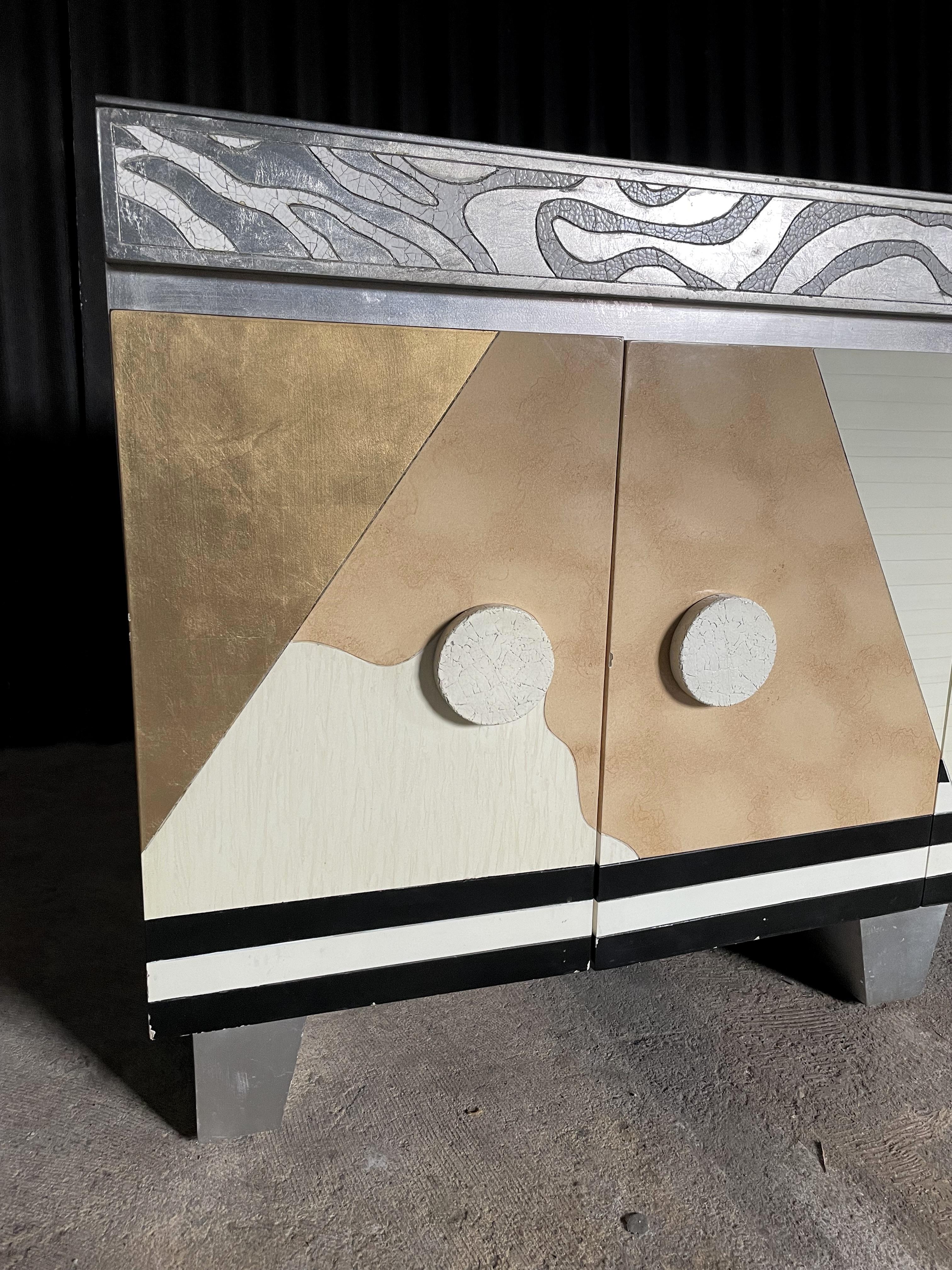 In the Deco style of furniture Designer, Ettore Sottsass, this cabinet is a piece of art on its own.
No need to weigh it down with items to make it look interesting. It does that all by itself.
Imagine it with a singular piece of art/sculpture or