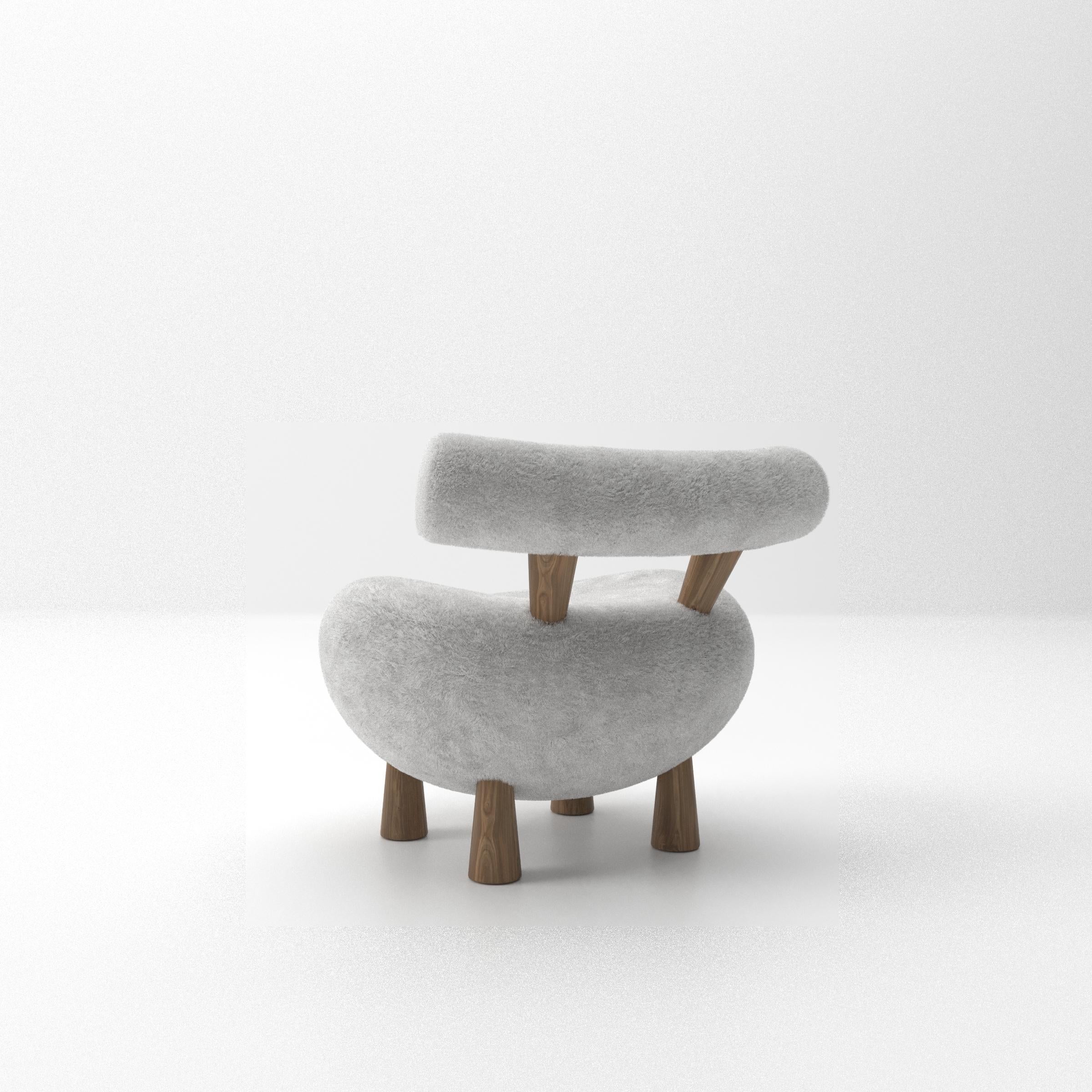 Drawing attention with its fun and eye-catching design, Lamb armchair is ready to take its place in your home with its high level of comfort. Torik, which has an extremely soft, comfortable and functional appeal with its organic form, expresses the