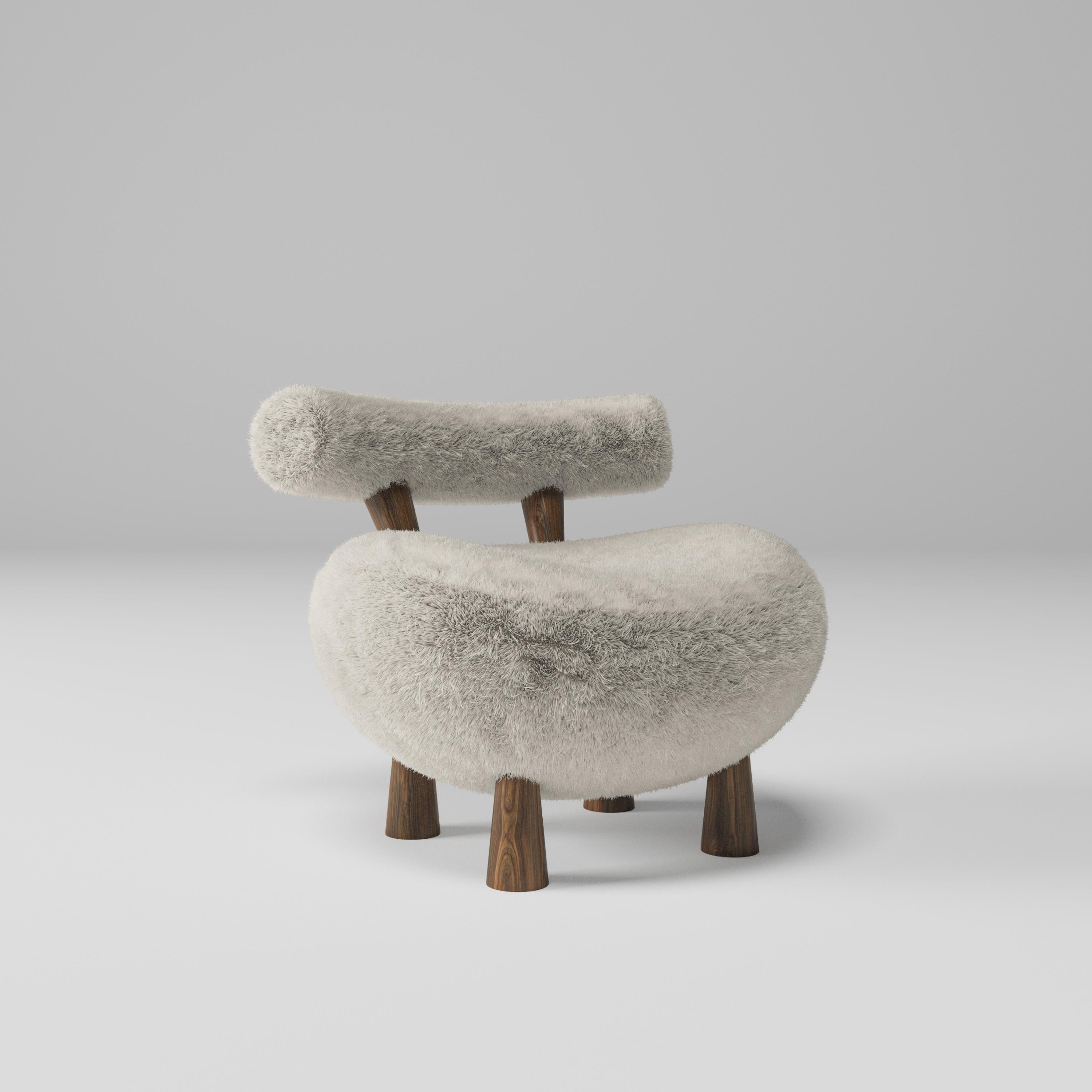 Lamb armchair

Lamb berjer is a one-of-a-kind piece of furniture designed by Mehmet Orel. With a highly organic shape, the Lamb appears to have been bred rather than made. The seat and back are upholstered in a soft, plush fabric that is