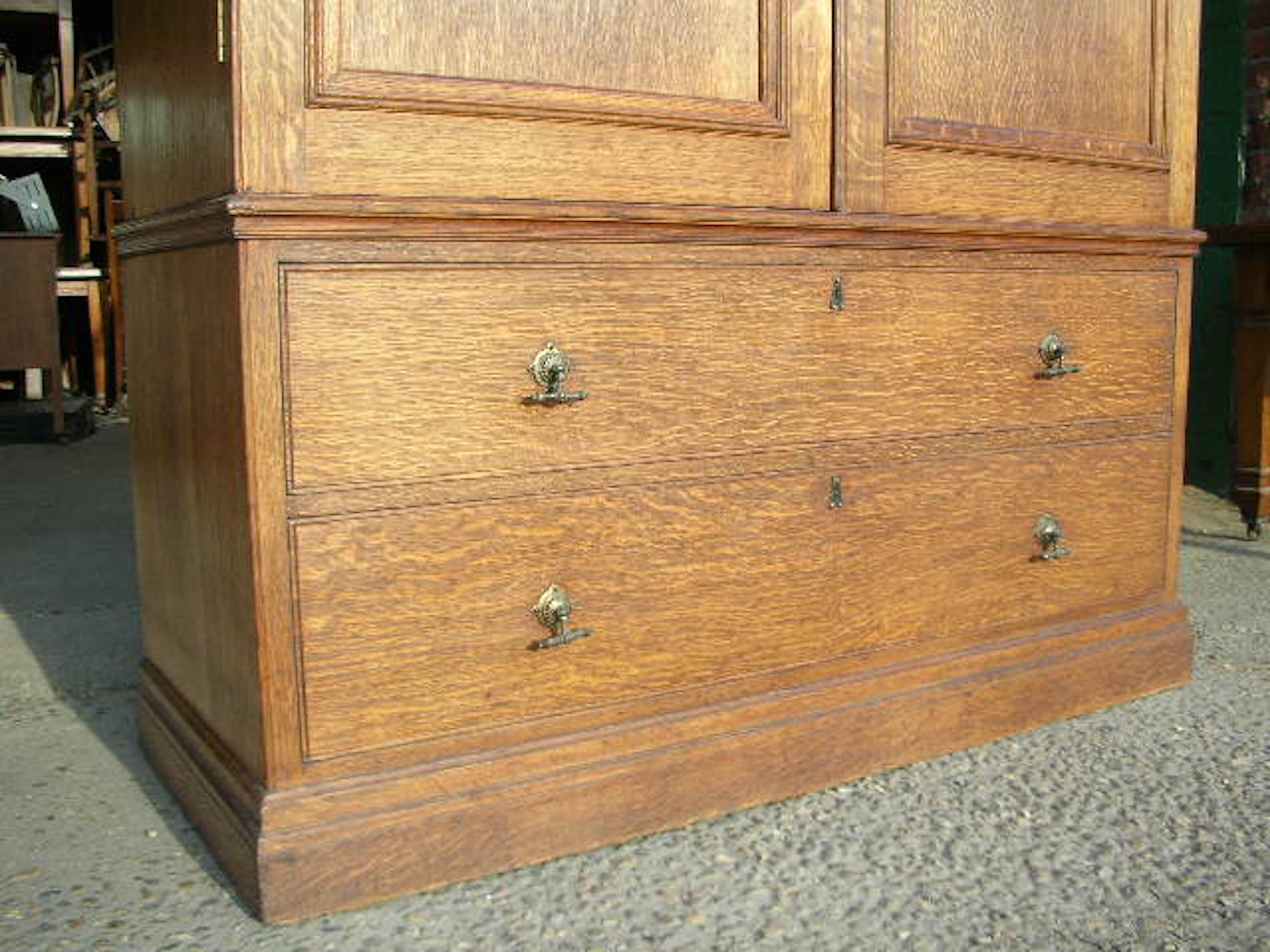 Oak Lamb of Manchester, an Aesthetic Movement Compactum Armoire Wardrobe