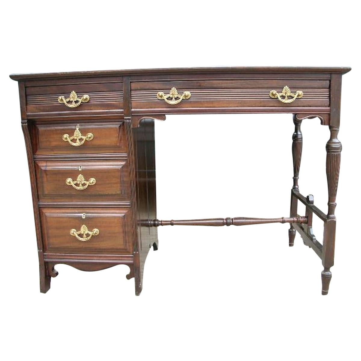 Lamb of Manchester, An Aesthetic Movement Walnut Writing Desk.