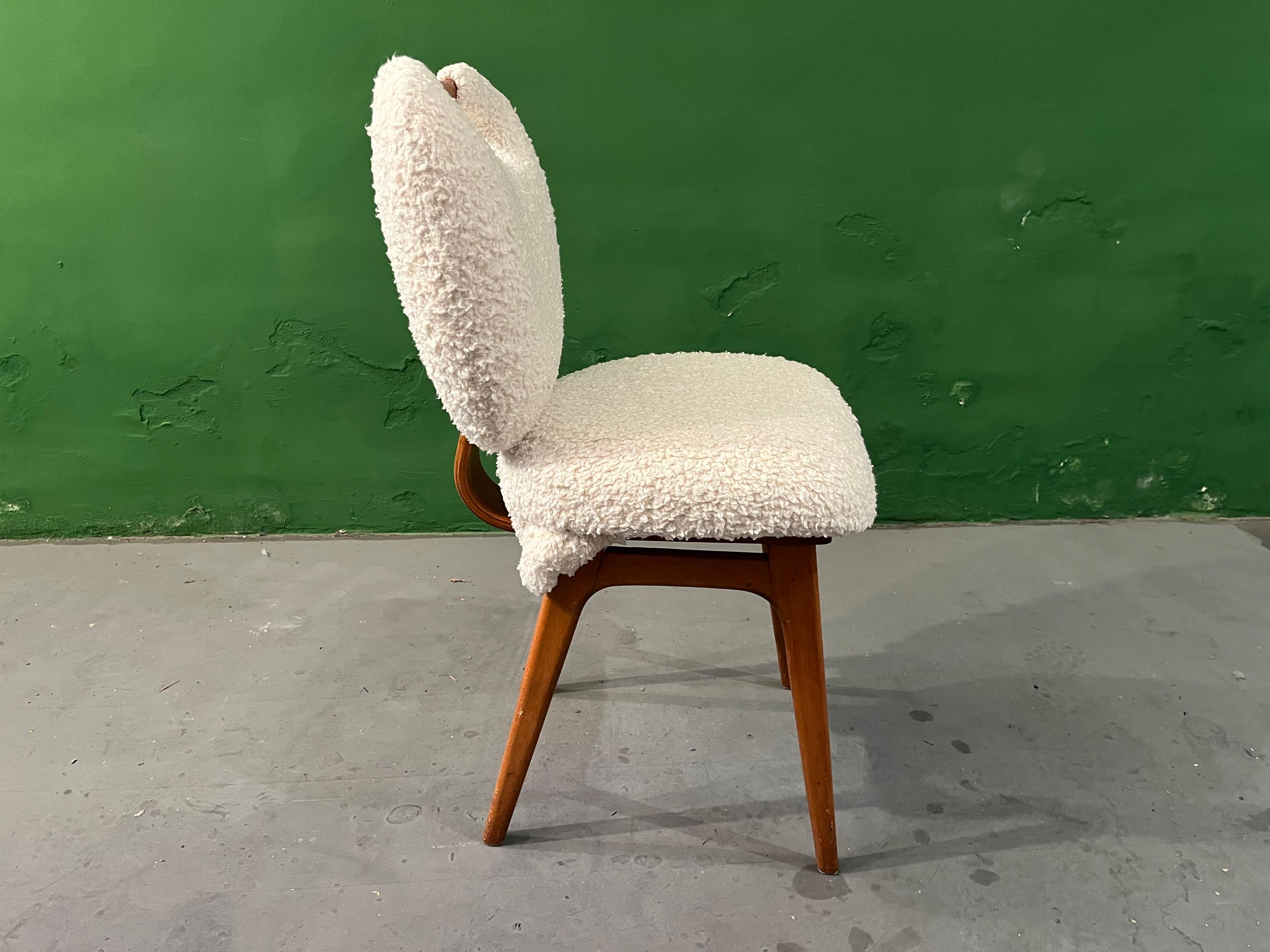 4 Bio-teddy/lamb-teddy dining room chair are all different. Upholstered in thick teddy, alterations made, very comforfortable. The idea was to give a traditional design a super contemporary style, make them one of a kind functional design