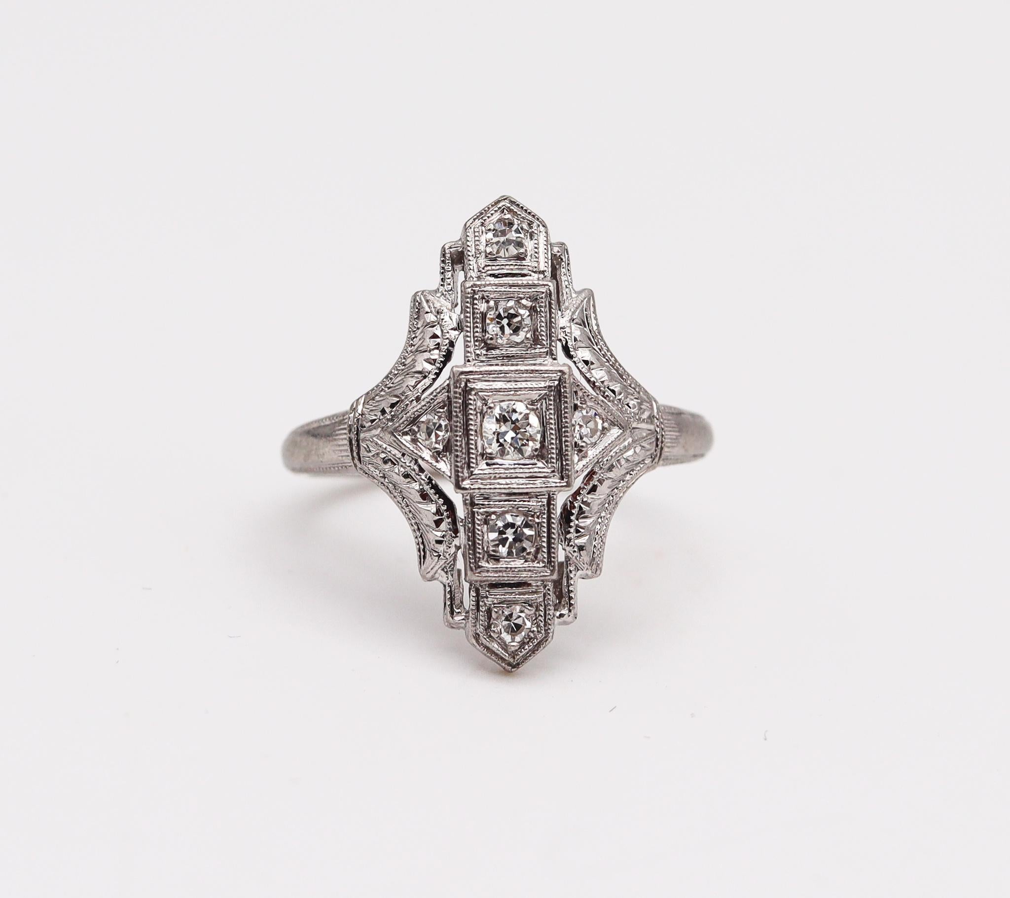 A ring designed by the Lambert Brothers.

Beautiful geometric piece, created in America by The Lambert Brothers Co during the Art deco period, back in the 1922. This delicate ring was crafted in solid white gold of 18 karats with the surfaces