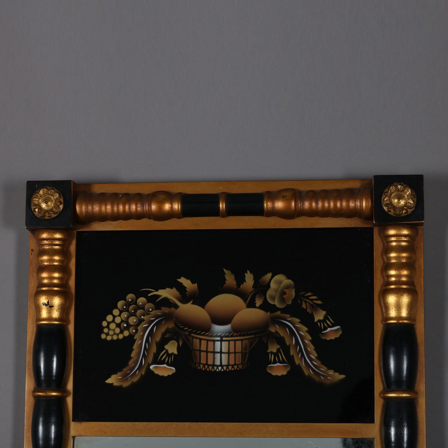 Trumeau wall mirror by Lambert Hitchcock features ebonized and giltwood column form frame with rosette die joints, upper panel with Eglomise still fruit still life, en verso original label, 20th century

***DELIVERY NOTICE – Due to COVID-19 we are