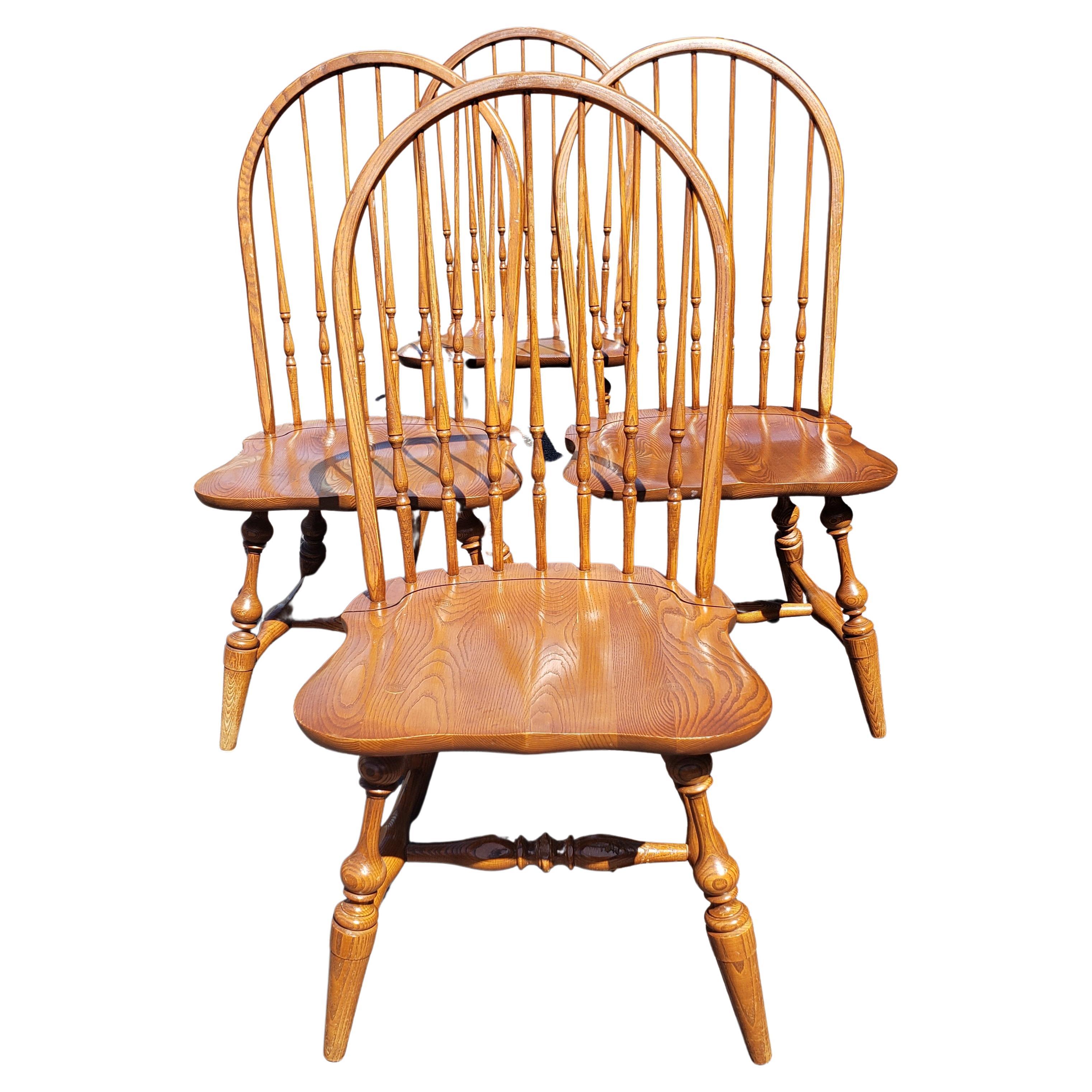 Set of 4 original Lambert Hitchcock quarter sawn oak mission dining chairs. Saddle seats. Seven beautiful spindles back. Good vintage condition.

W5041622.