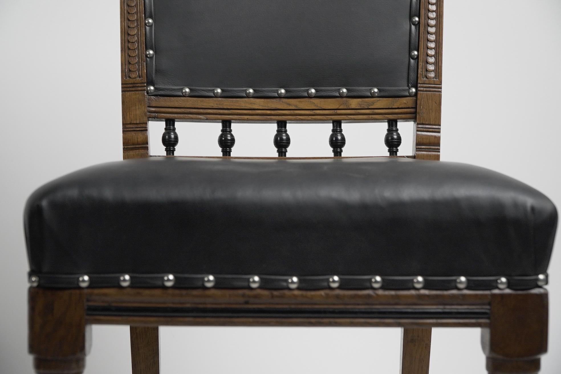 Hand-Carved Lambs of Manchester A Set of Four Aesthetic Movement Oak & Leather Dining Chairs For Sale