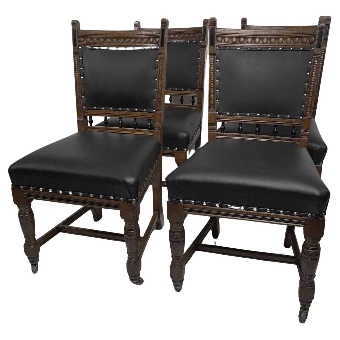 Lambs of Manchester A Set of Four Aesthetic Movement Oak & Leather Dining Chairs For Sale