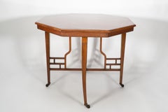 Lambs of Manchester. Anglo-Japanese mahogany octagonal centre table Godwin style