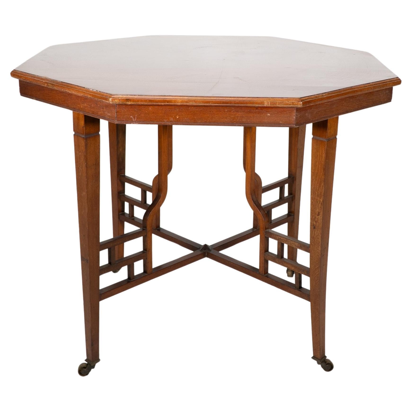 Lambs of Manchester. Anglo-Japanese mahogany octagonal centre table Godwin style
