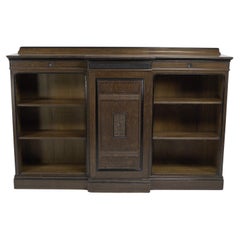 Used Lambs of Manchester (stamped). A fine Aesthetic Movement oak breakfront bookcase