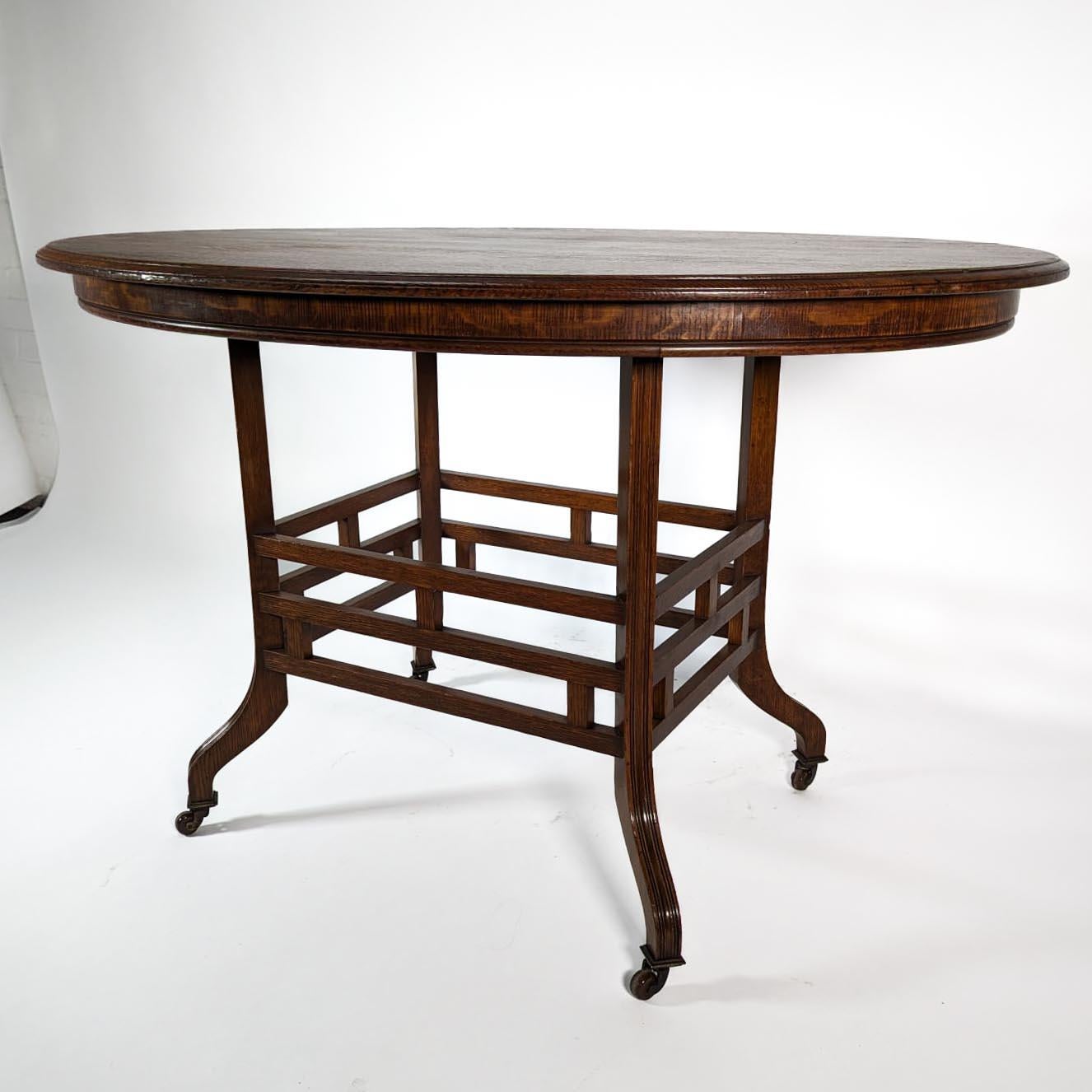 Lambs of Manchester, stamped Lambs. A rare Anglo-Japanese oak oval centre table For Sale 2