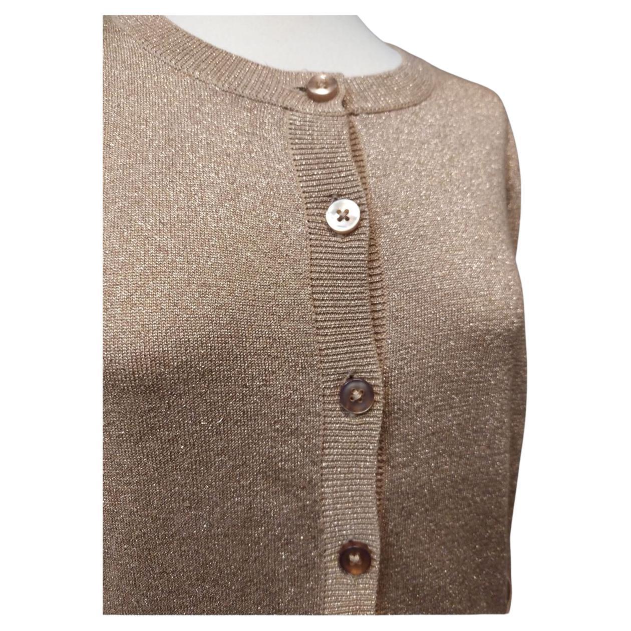 Cotton (56%) Polyamid (29%) Silk (8%) Metal Powder pink color Round neck Buttons closure Two pockets Length shoulder/hem cm 58 (2283 inches) Shoulders cm 355 (1397 inches)
