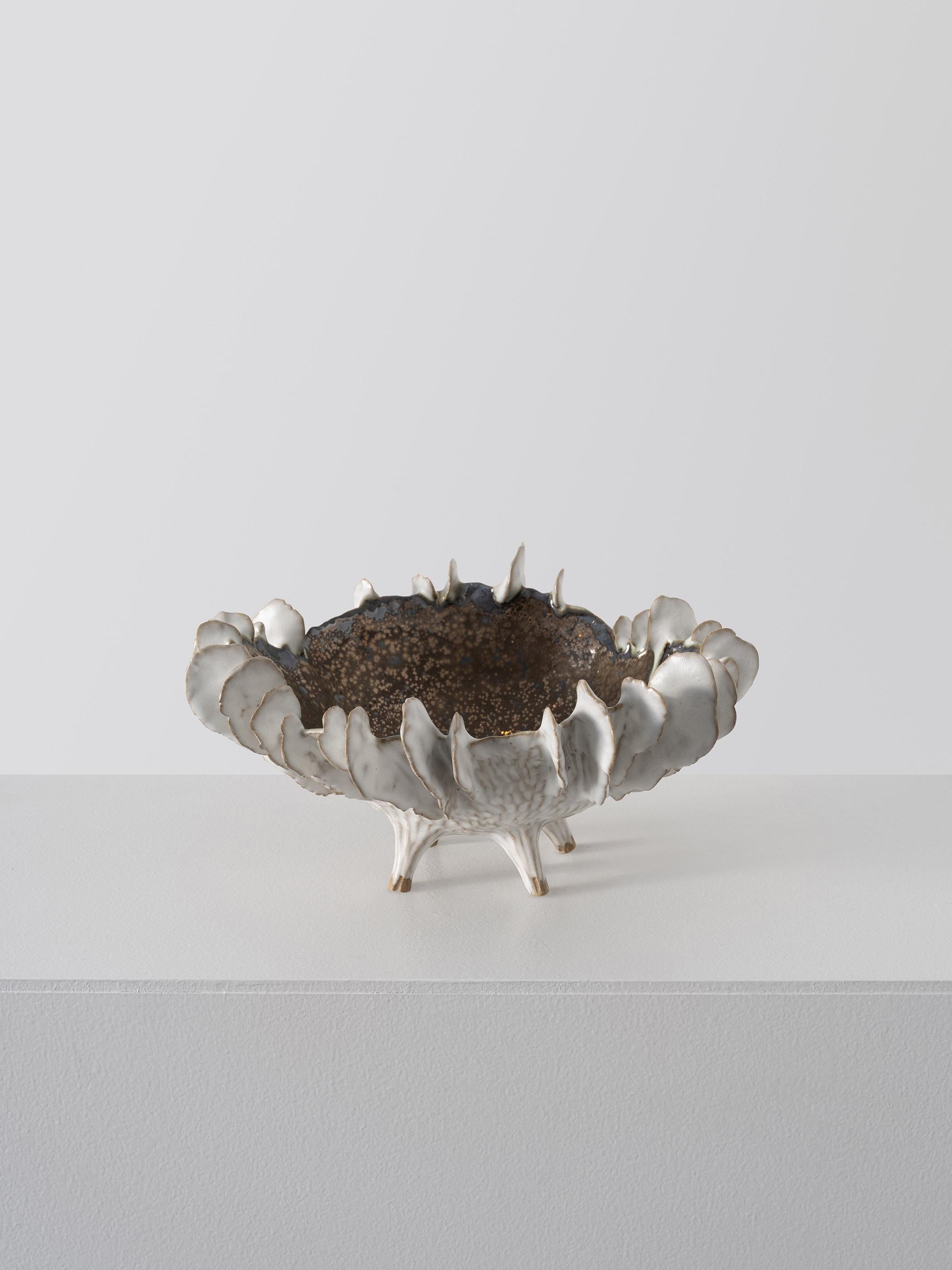 Trish DeMasi
Lamella bowl, 2022.
Metallic and white glazed ceramic.
Measures: 10 x 12 x 6 in.
