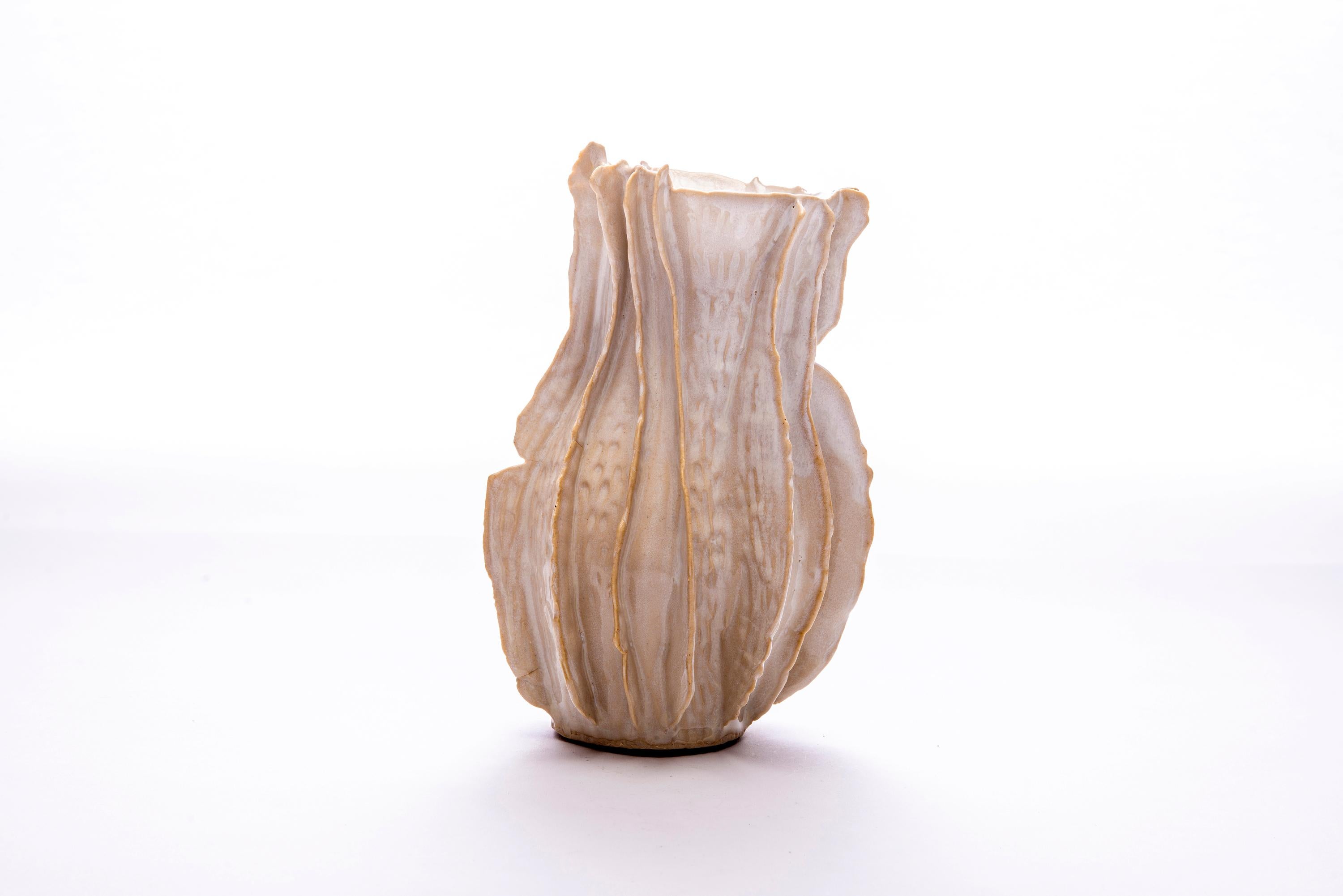 Trish DeMasi
Lamella Vessel, 2020
Glazed Ceramic
10 x 6 x 6.5 in

Trish DeMasi's Lamella Collection of glazed ceramic vessels features natural textures and biomorphic shapes in subtle and pleasing earth tones.