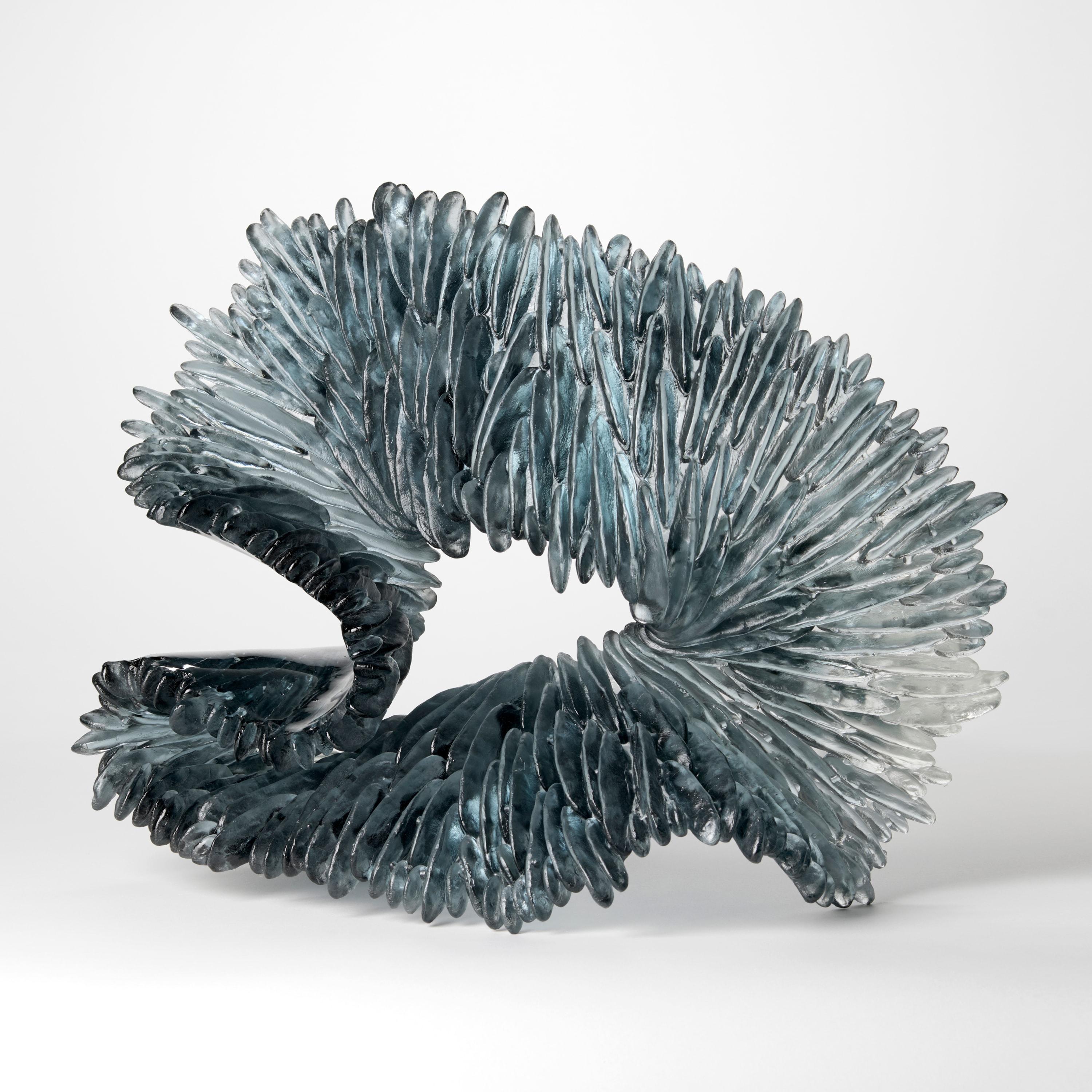 'Lamellae III' è una scultura in vetro unica dell'artista britannica Nina Casson McGarva.

Casson McGarva getta il vetro in uno stampo piatto dove introduce tutte le texture superficiali, tutte uniche e distinte. Il vetro viene poi sottoposto a una