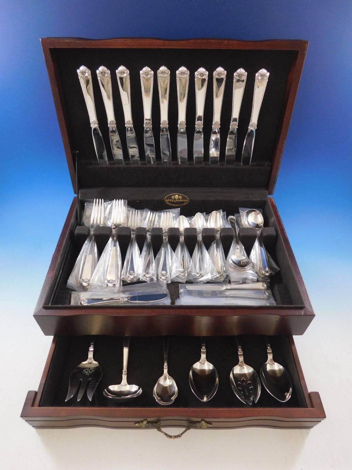 Exceptional dinner size Lamerie by Tuttle Sterling Silver Flatware set - 66 pieces. This set includes:

10 Dinner Size Knives, 9 7/8